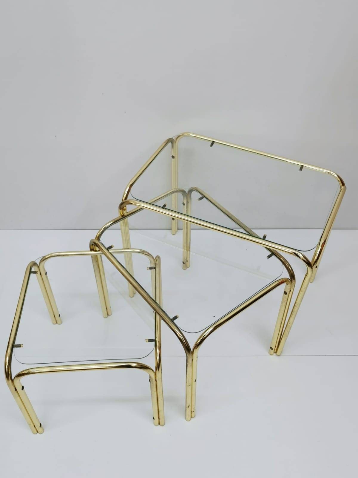 Set of 3 Mid Century Modern Gold brass And Smoked Glass Stand Table set, Living Room Organiser, or flower table 1960s