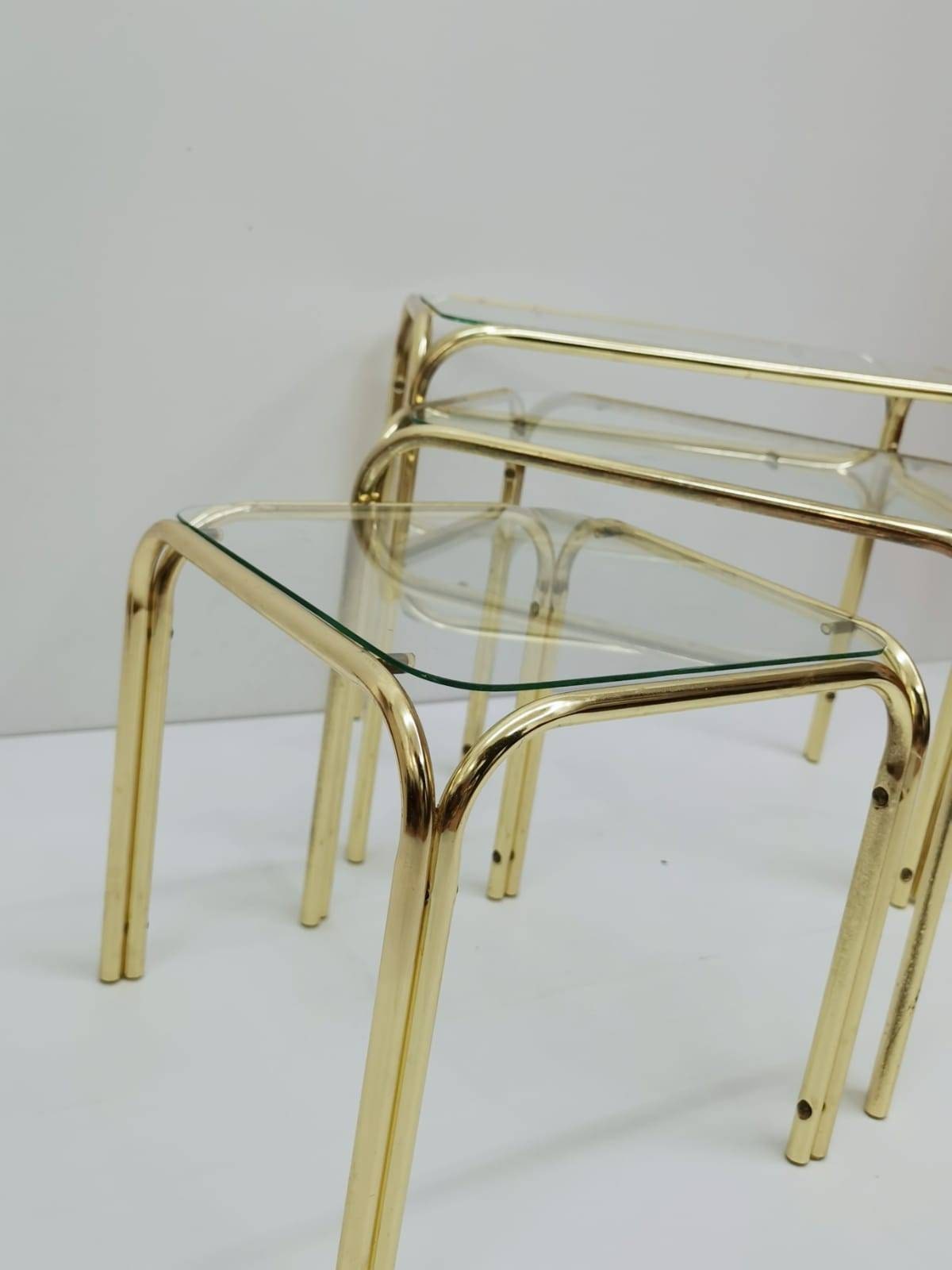 Set of 3 Mid Century Modern Gold brass And Smoked Glass Stand Table set, Living Room Organiser, or flower table 1960s