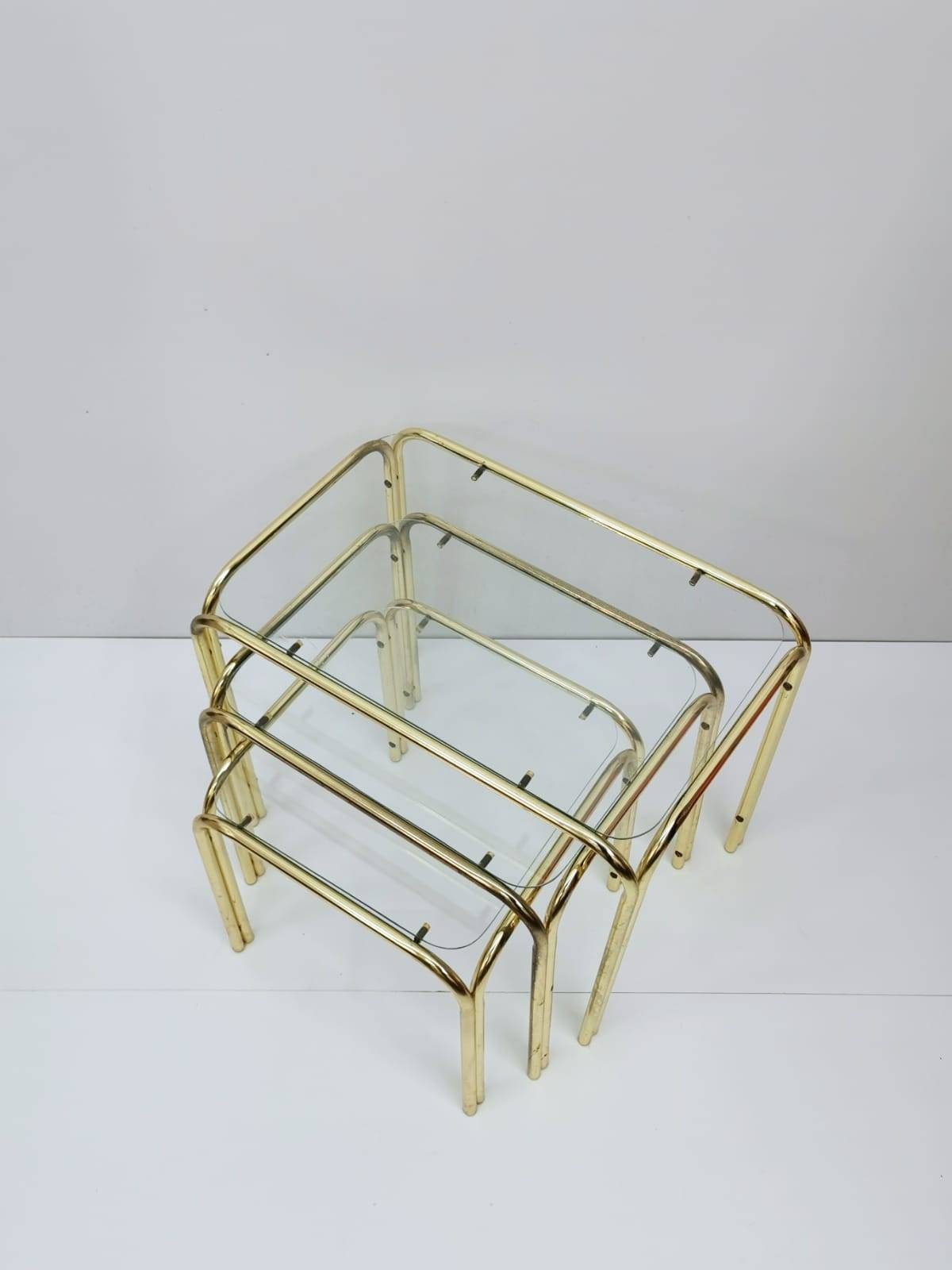 Set of 3 Mid Century Modern Gold brass And Smoked Glass Stand Table set, Living Room Organiser, or flower table 1960s