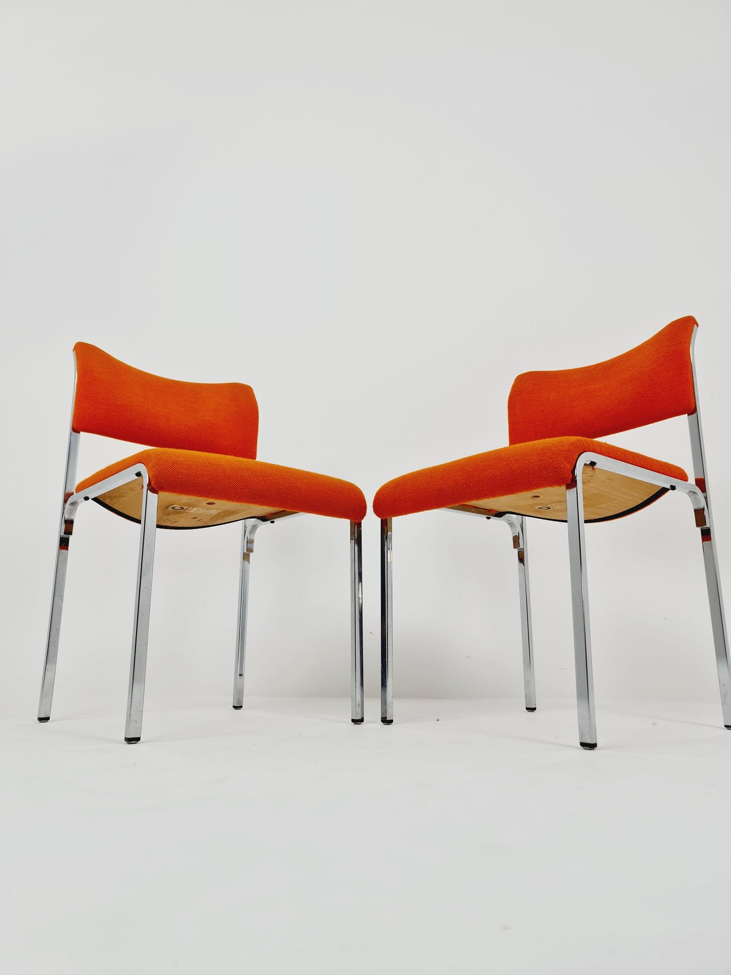 Set of 2 orange girsberger eurochairs, space age design 1970s