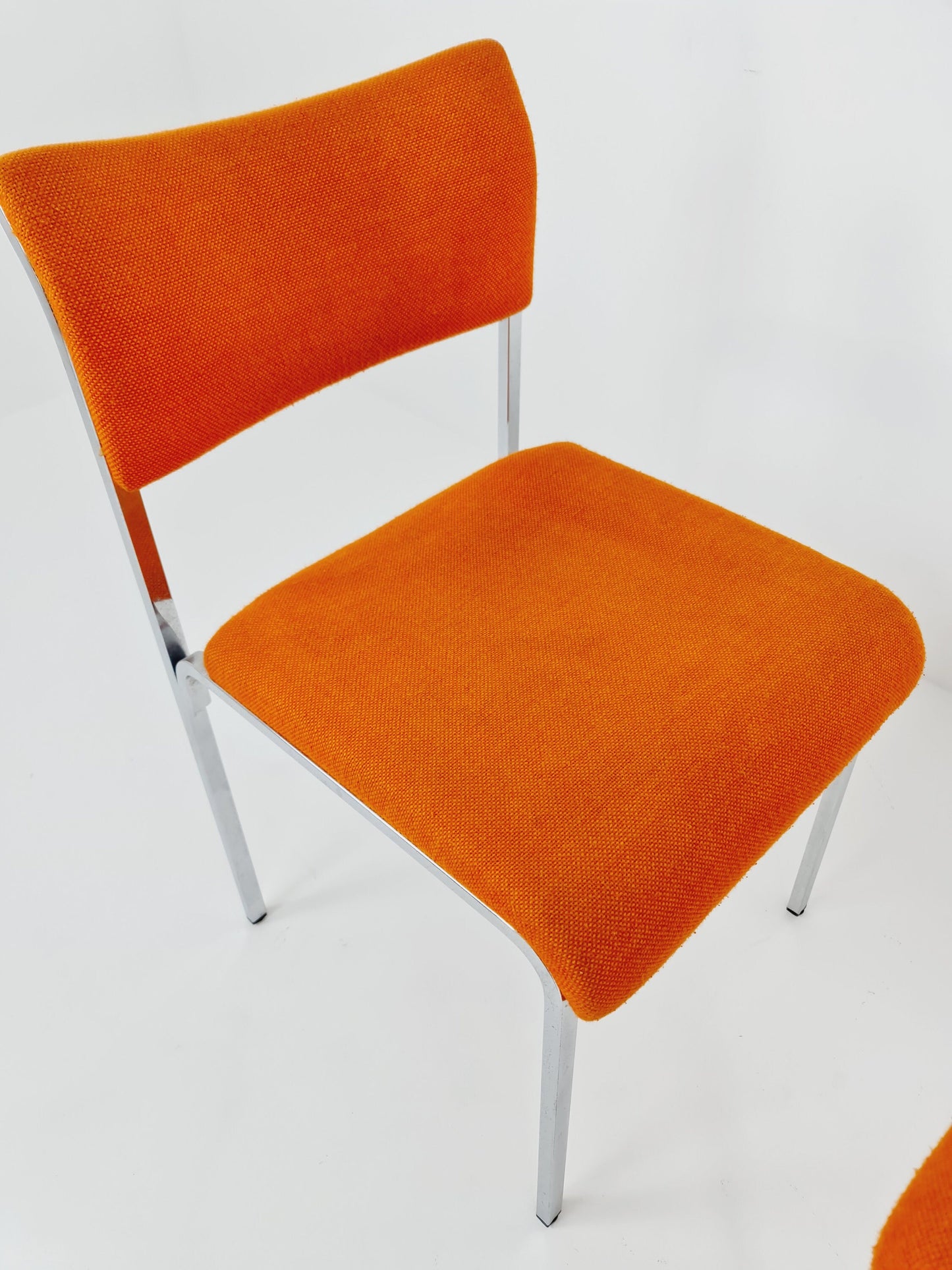 Set of 2 orange girsberger eurochairs, space age design 1970s