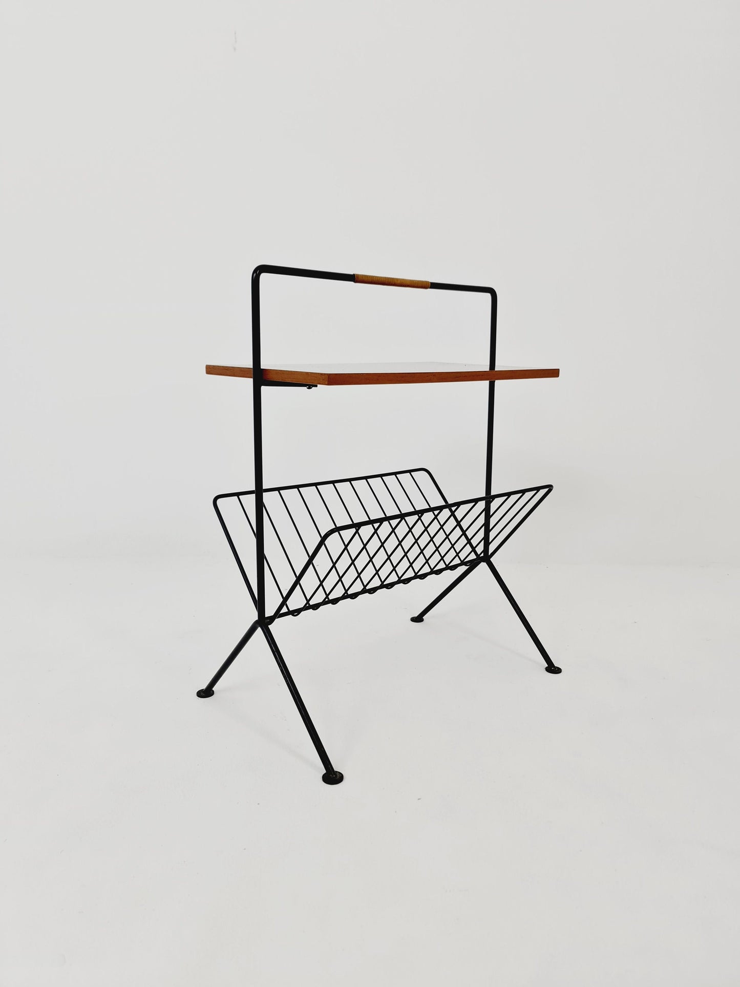 String German vintage side table with newspaper shelf from the 60s