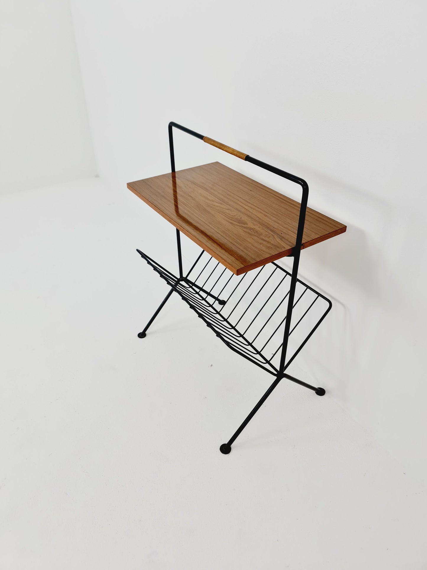 String German vintage side table with newspaper shelf from the 60s
