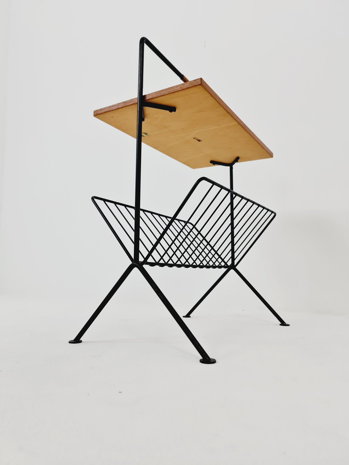 String German vintage side table with newspaper shelf from the 60s