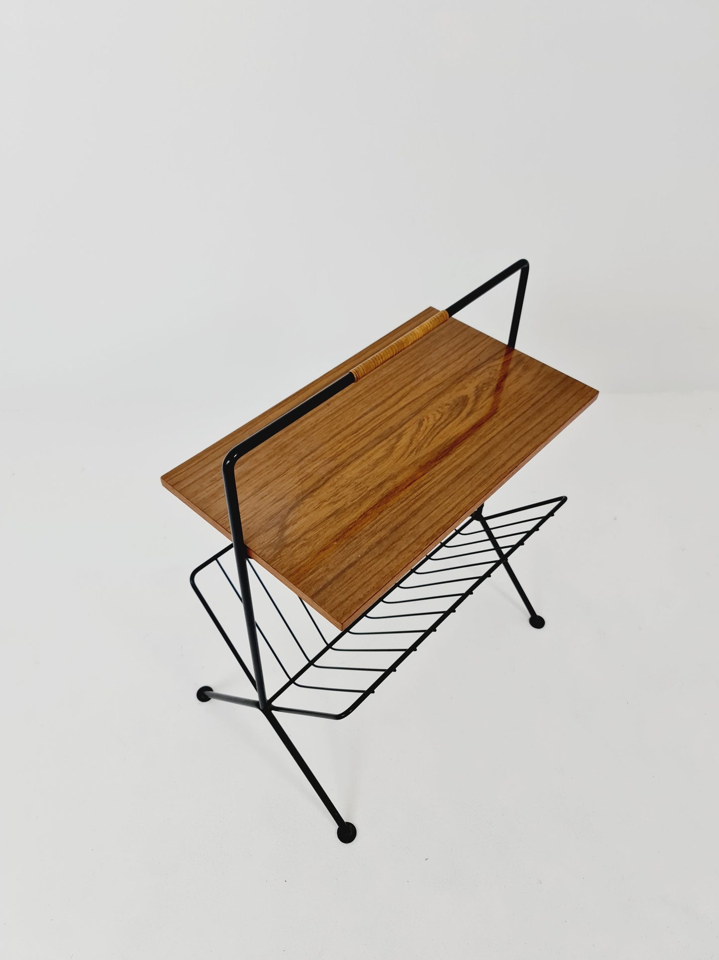 String German vintage side table with newspaper shelf from the 60s