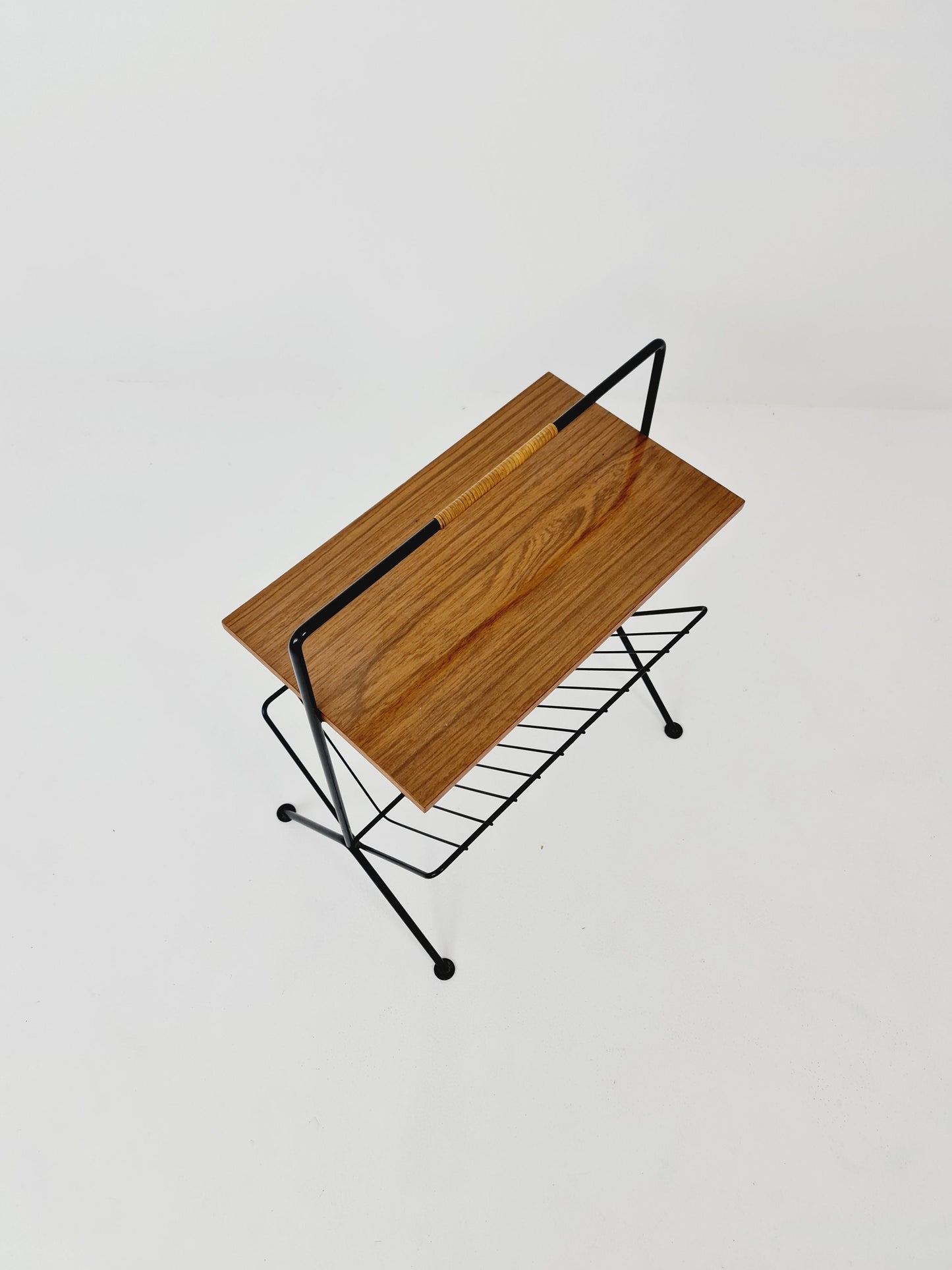 String German vintage side table with newspaper shelf from the 60s