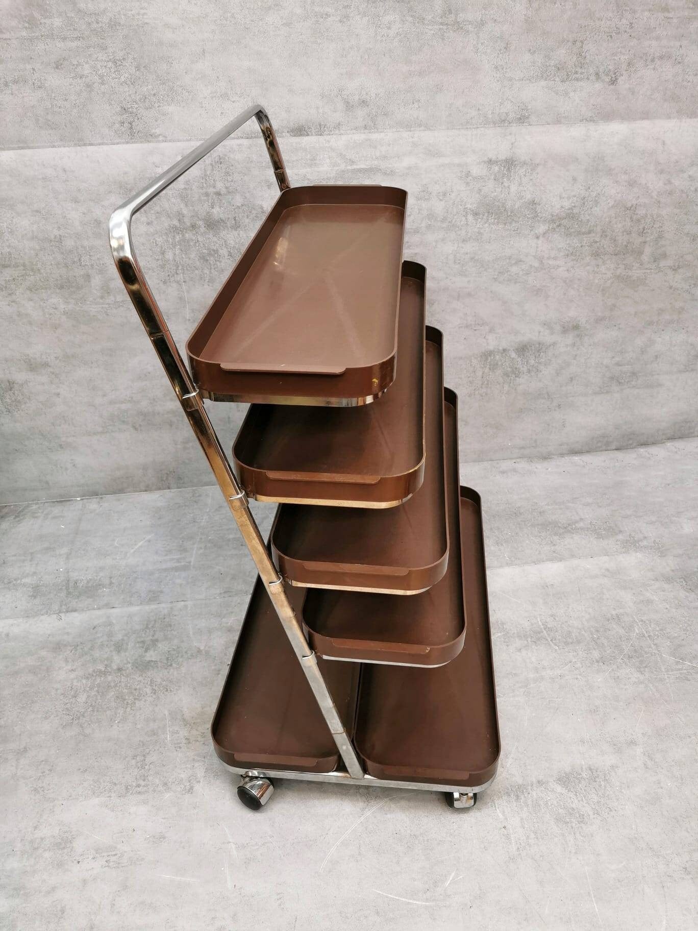 Space age flower or storage shelves unite on casters Italy 1980s