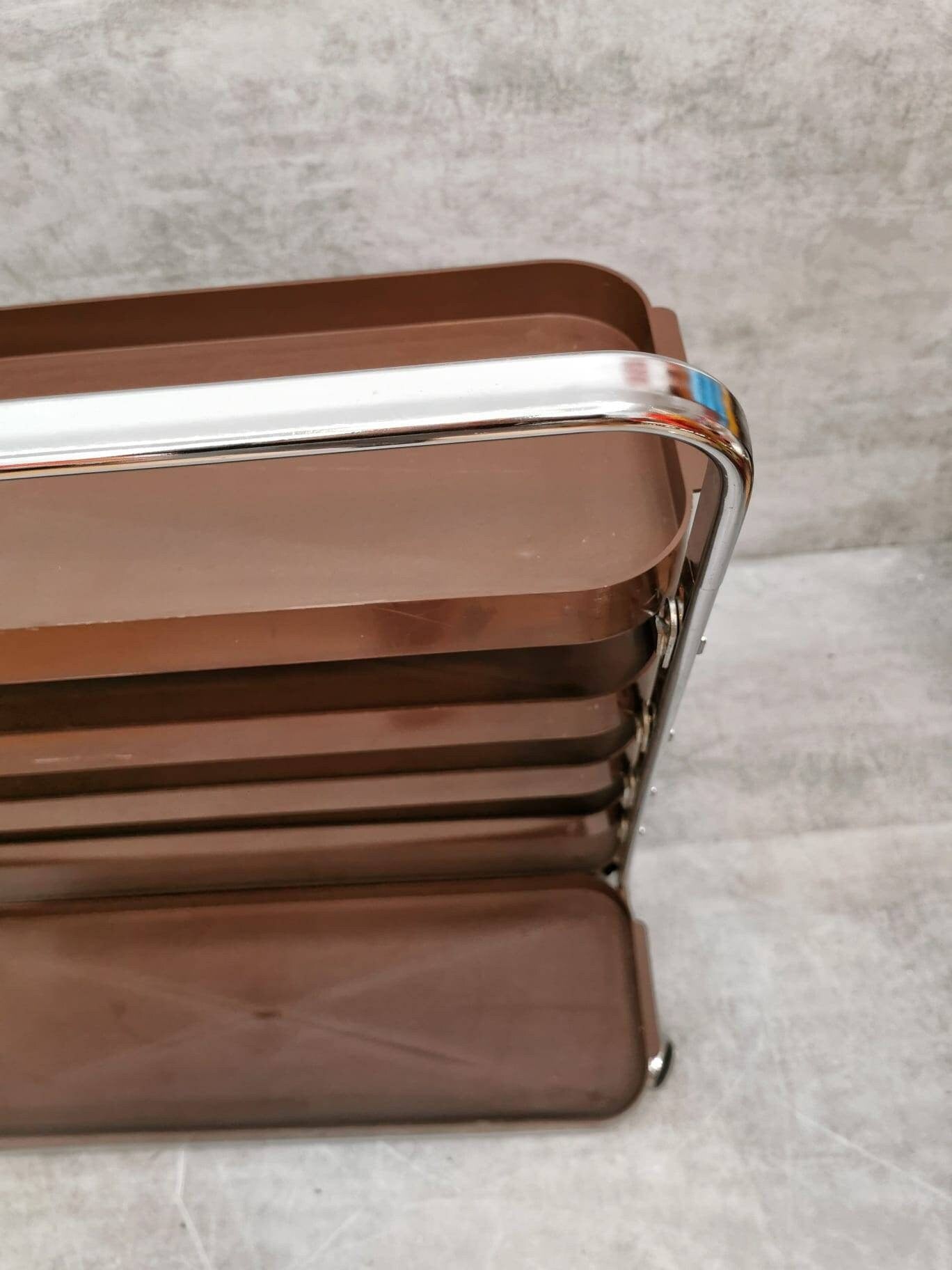 Space age flower or storage shelves unite on casters Italy 1980s