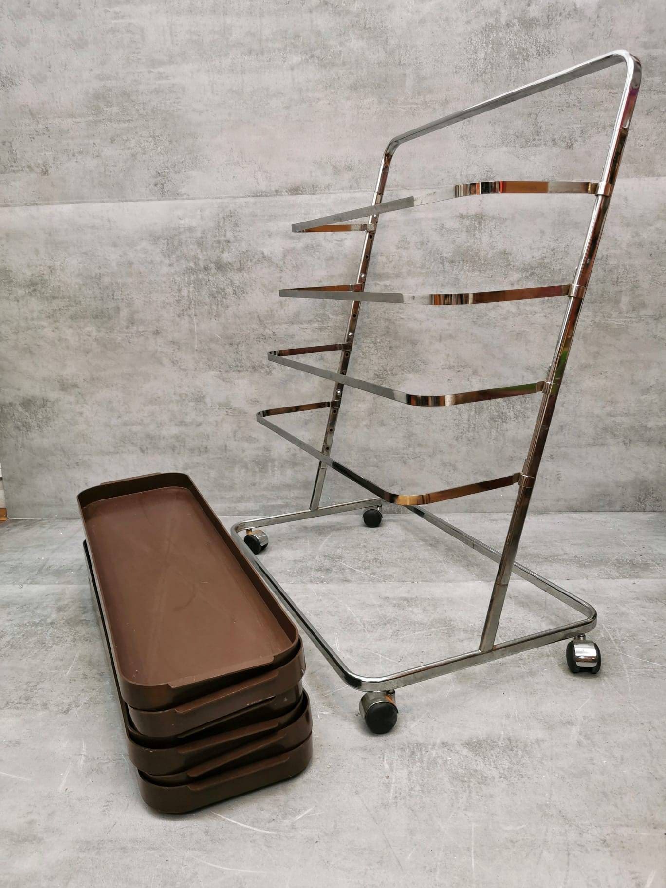 Space age flower or storage shelves unite on casters Italy 1980s