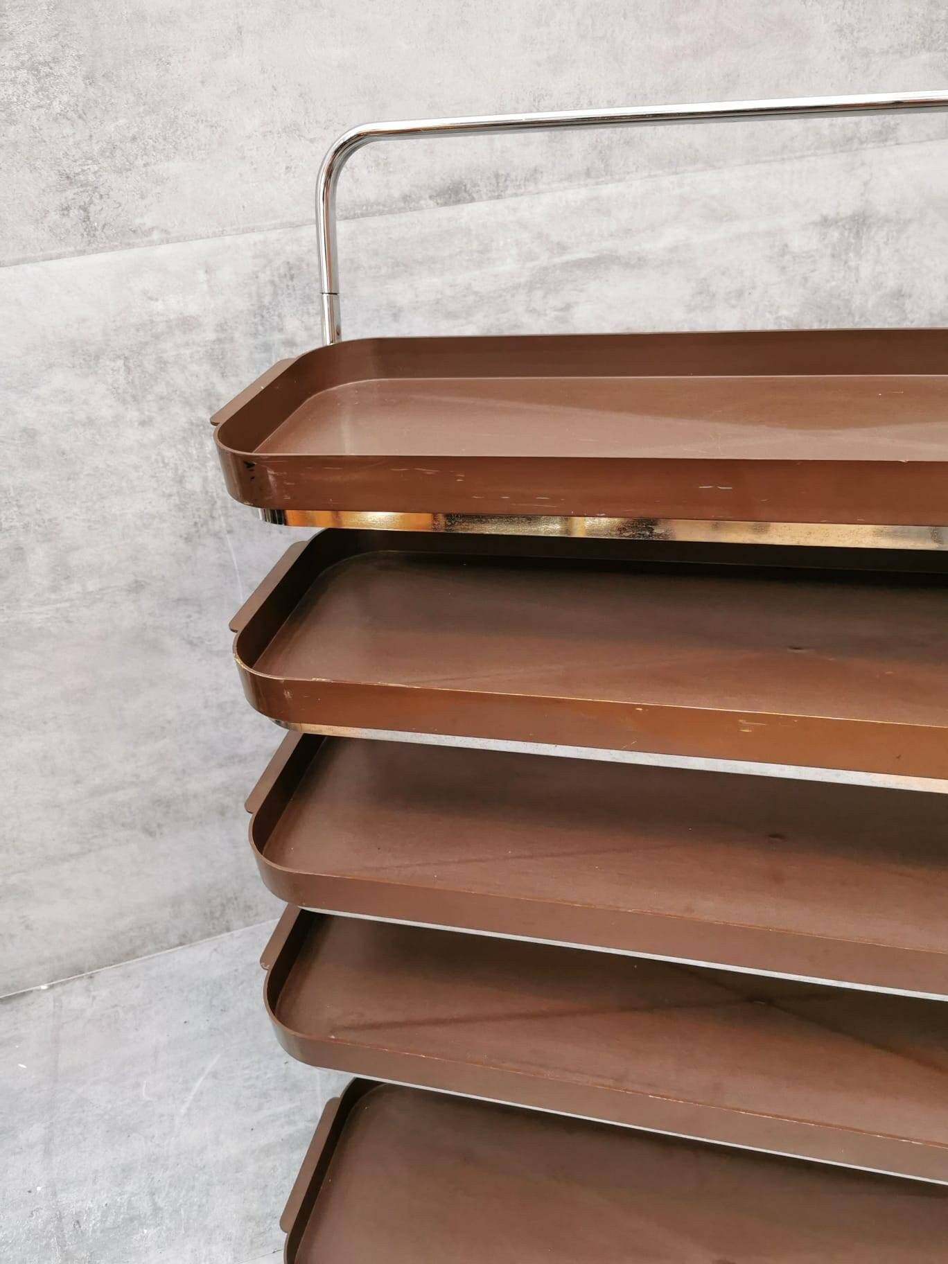 Space age flower or storage shelves unite on casters Italy 1980s