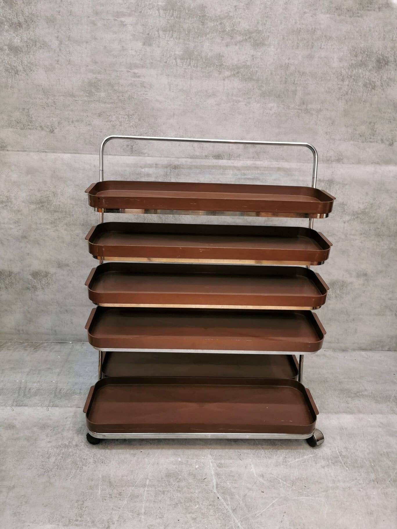 Space age flower or storage shelves unite on casters Italy 1980s