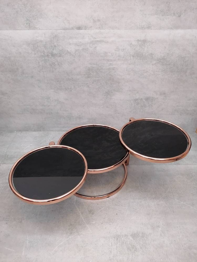 Mid-century rose gold and black glass 3-tier swivel coffee table by Milo Baughman bauhaus