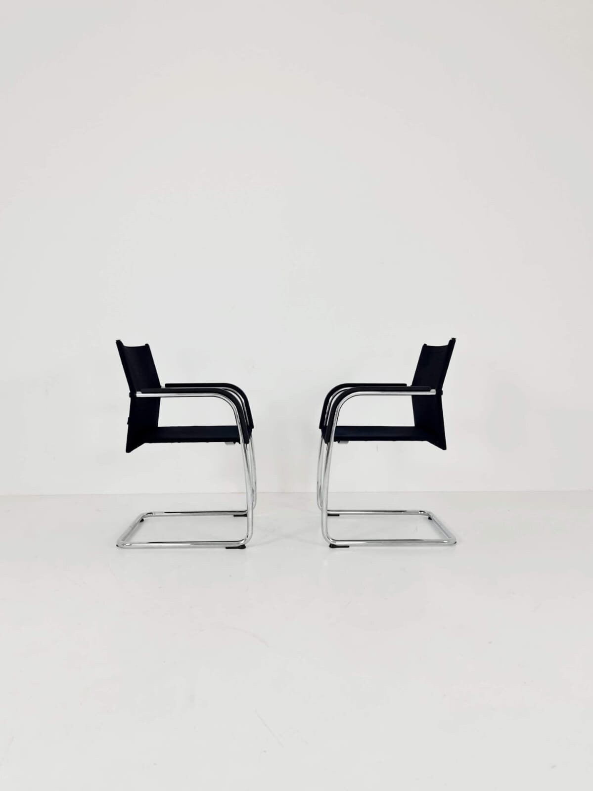 2 x Vitra AC3 Antonio Citterio Chair with chrome and black textile.