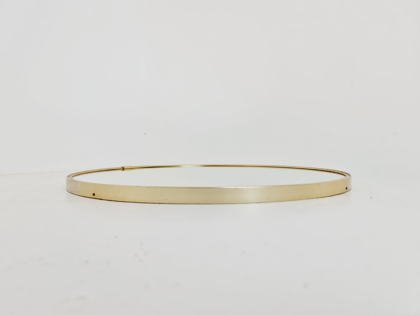Mid Century round Brass mirror from the 60s