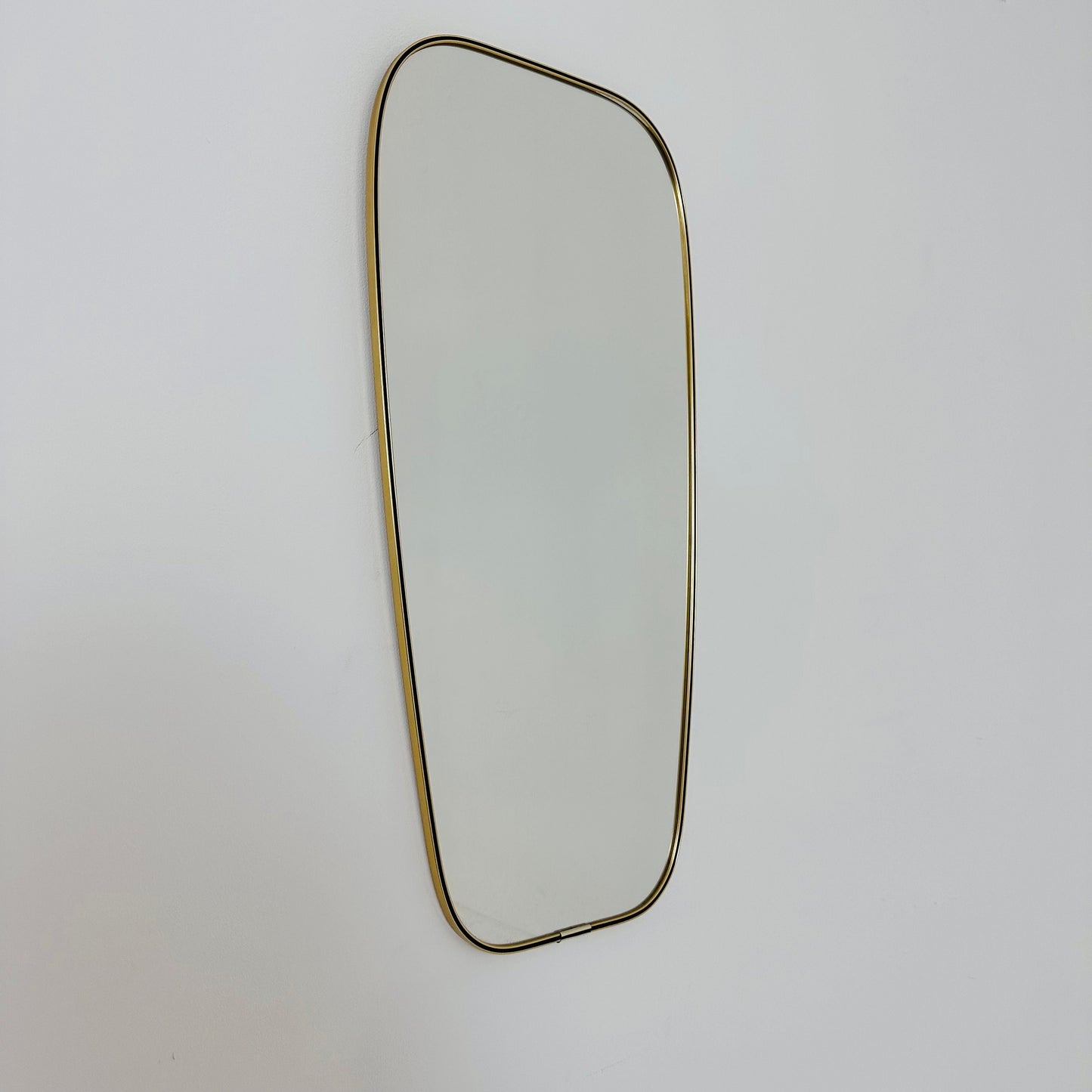 Mid Century asymmetric German brass Original kidney wall mirror from the 60s model number 986