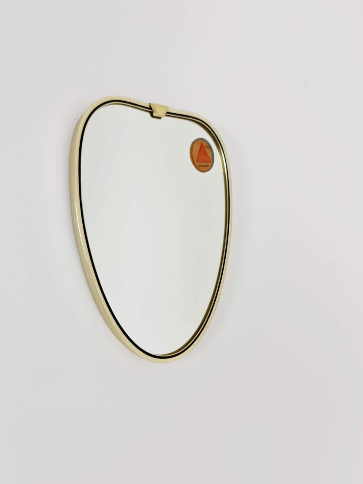 Small Midcentury Brass wall mirror with braided hanging strap by west Spiegel Germany 1960s