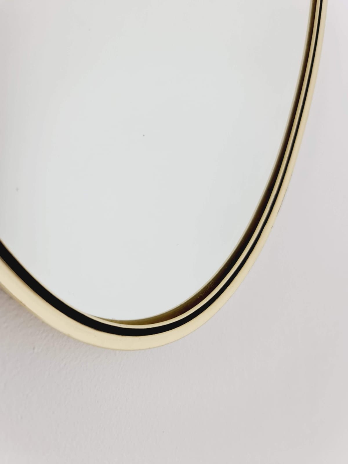 Small Midcentury Brass wall mirror with braided hanging strap by west Spiegel Germany 1960s