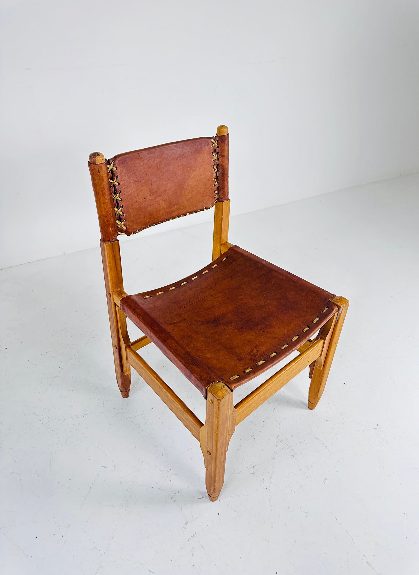 Vintage cognac leather hunting lodge chairs designed by Biermann Werner for Arte Sano 1960