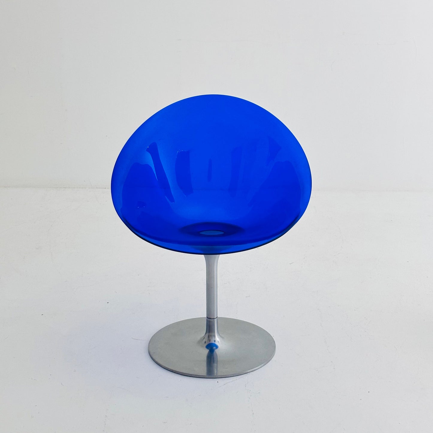 yellow Eros chair with aluminum swivel base by Philippe Starck for Kartell. Italy.