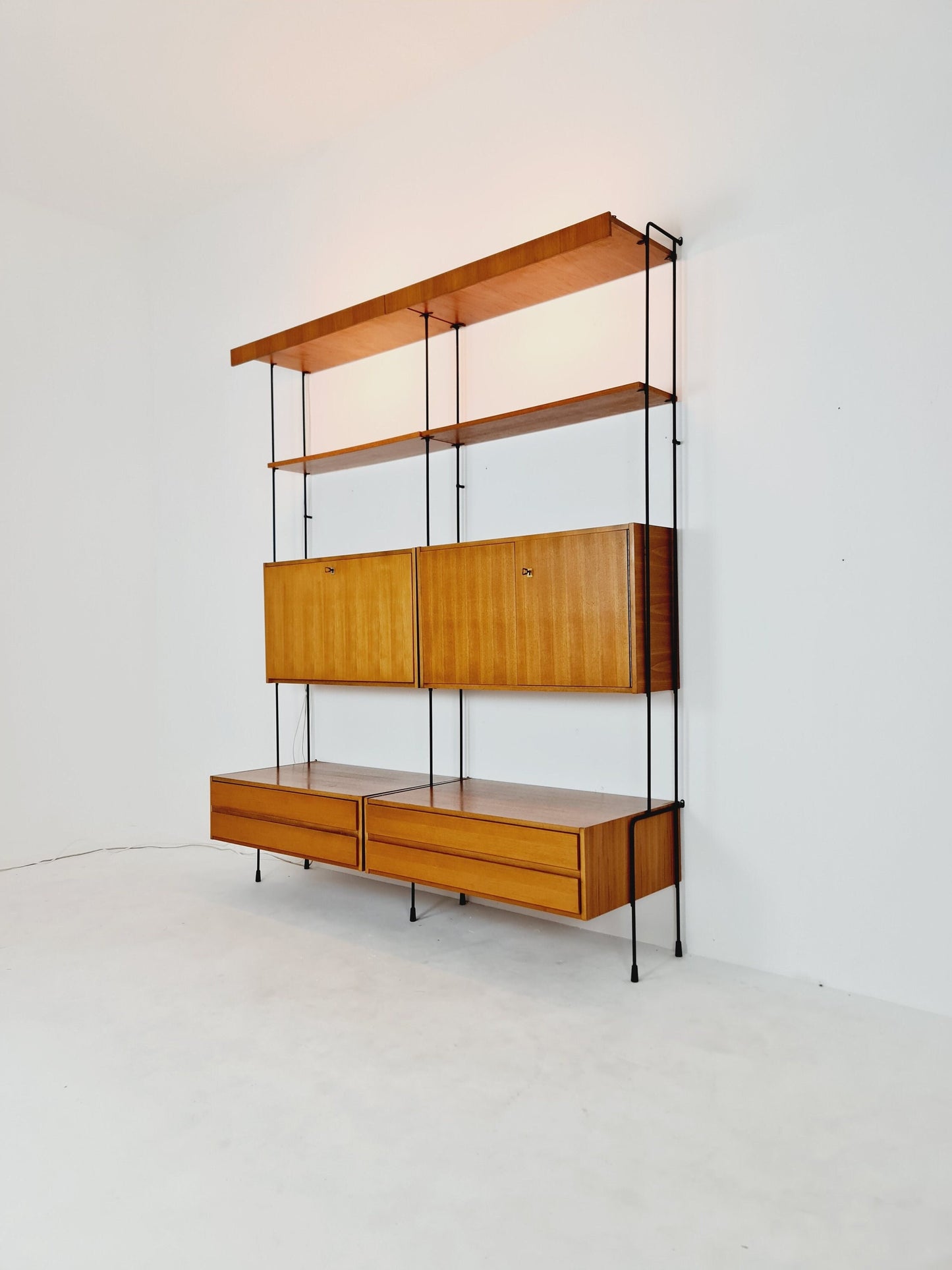 Mid century Teak 8 pieces shelving unit by Hilker for Omnia, Germany 1960s