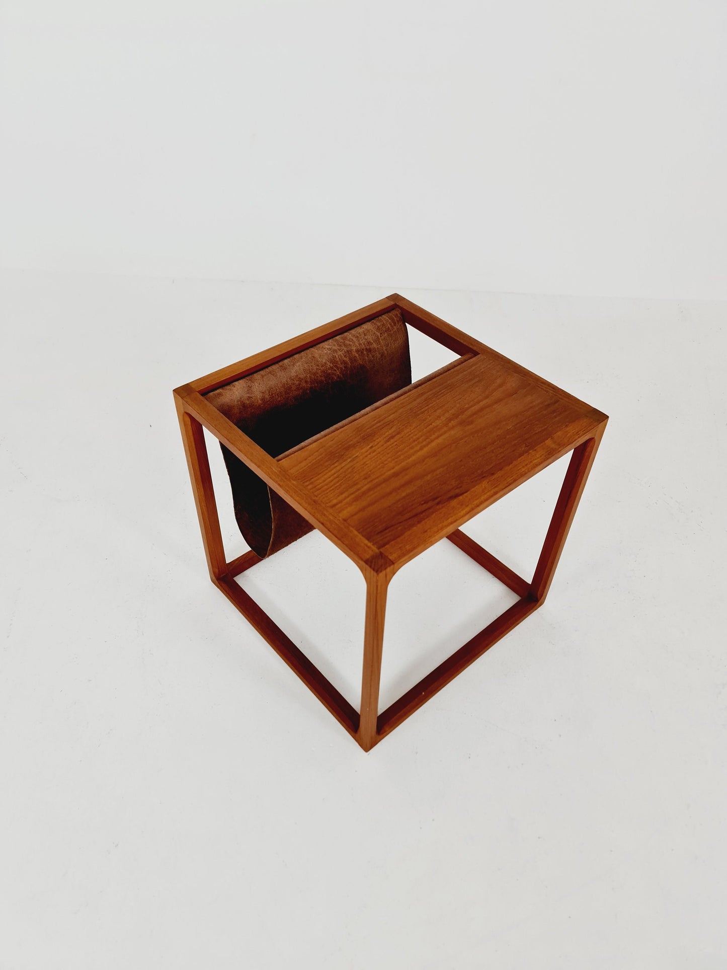Midcentury Danish teak side table with Magazine Leather Pouch by Aksel kjersgaard 1960s