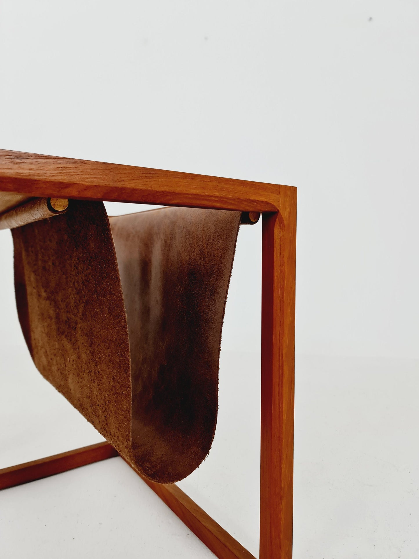 Midcentury Danish teak side table with Magazine Leather Pouch by Aksel kjersgaard 1960s