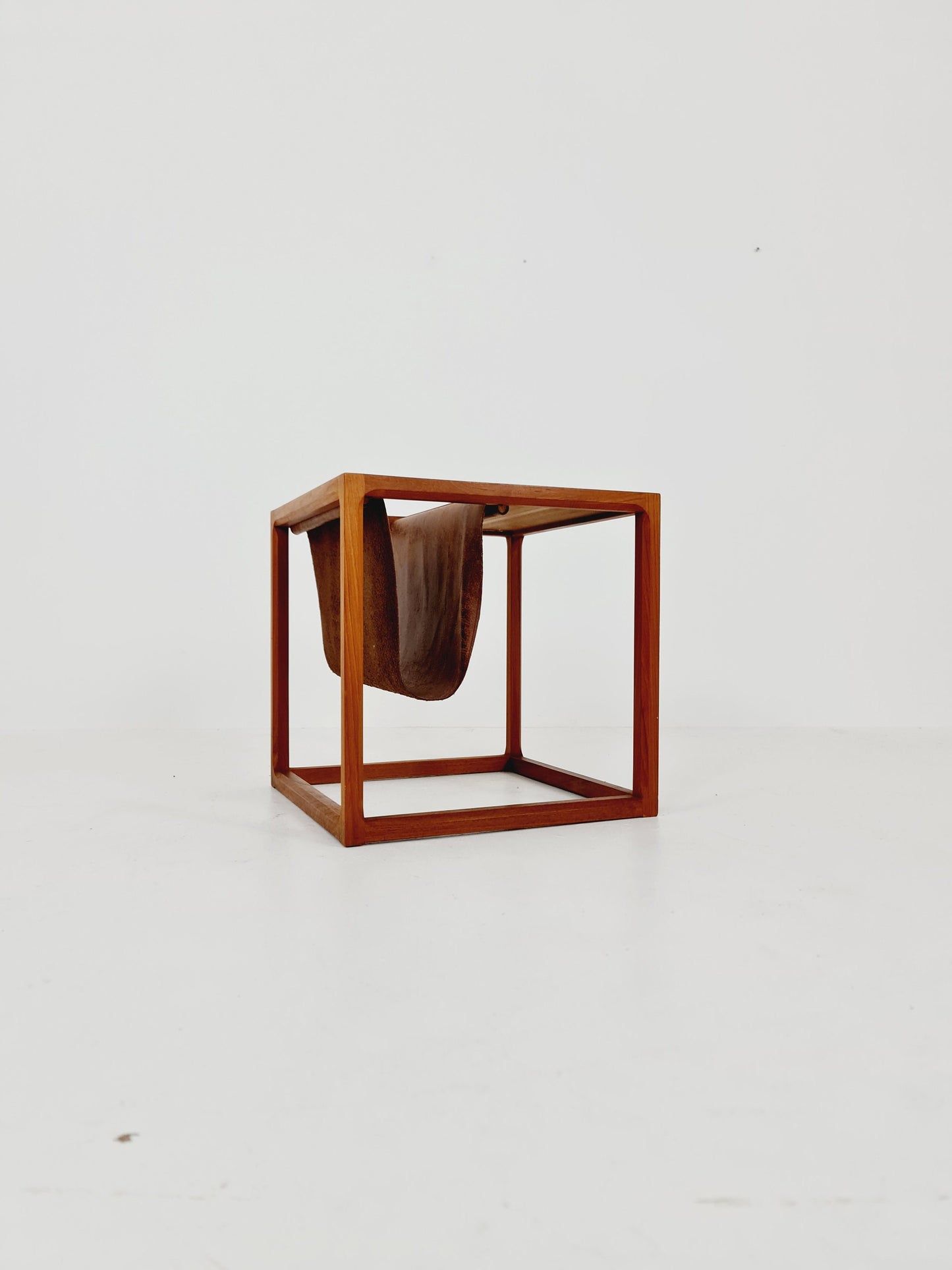Midcentury Danish teak side table with Magazine Leather Pouch by Aksel kjersgaard 1960s