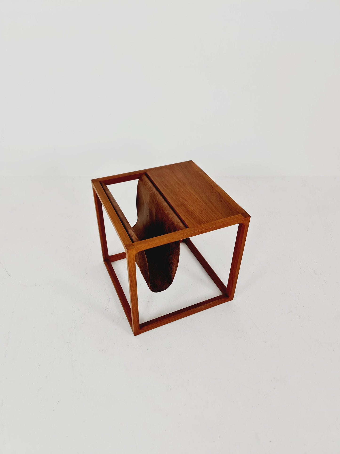 Midcentury Danish teak side table with Magazine Leather Pouch by Aksel kjersgaard 1960s