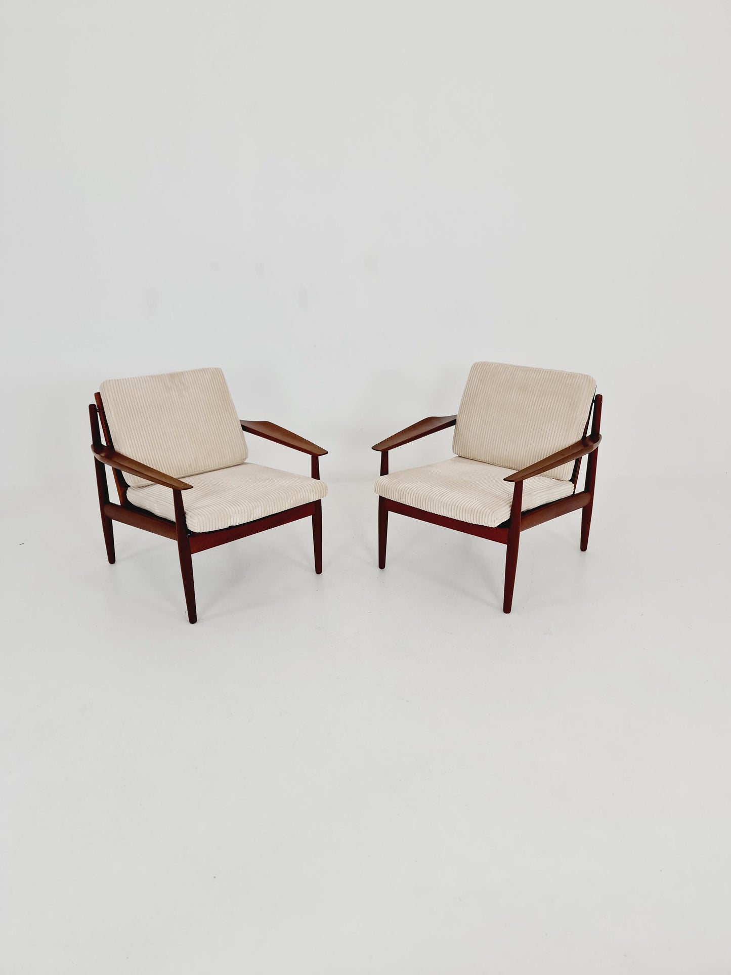 Mid century easy lounge chairs by Grete Jalk, Denmark, teak & brass, 19560s, Set of 2