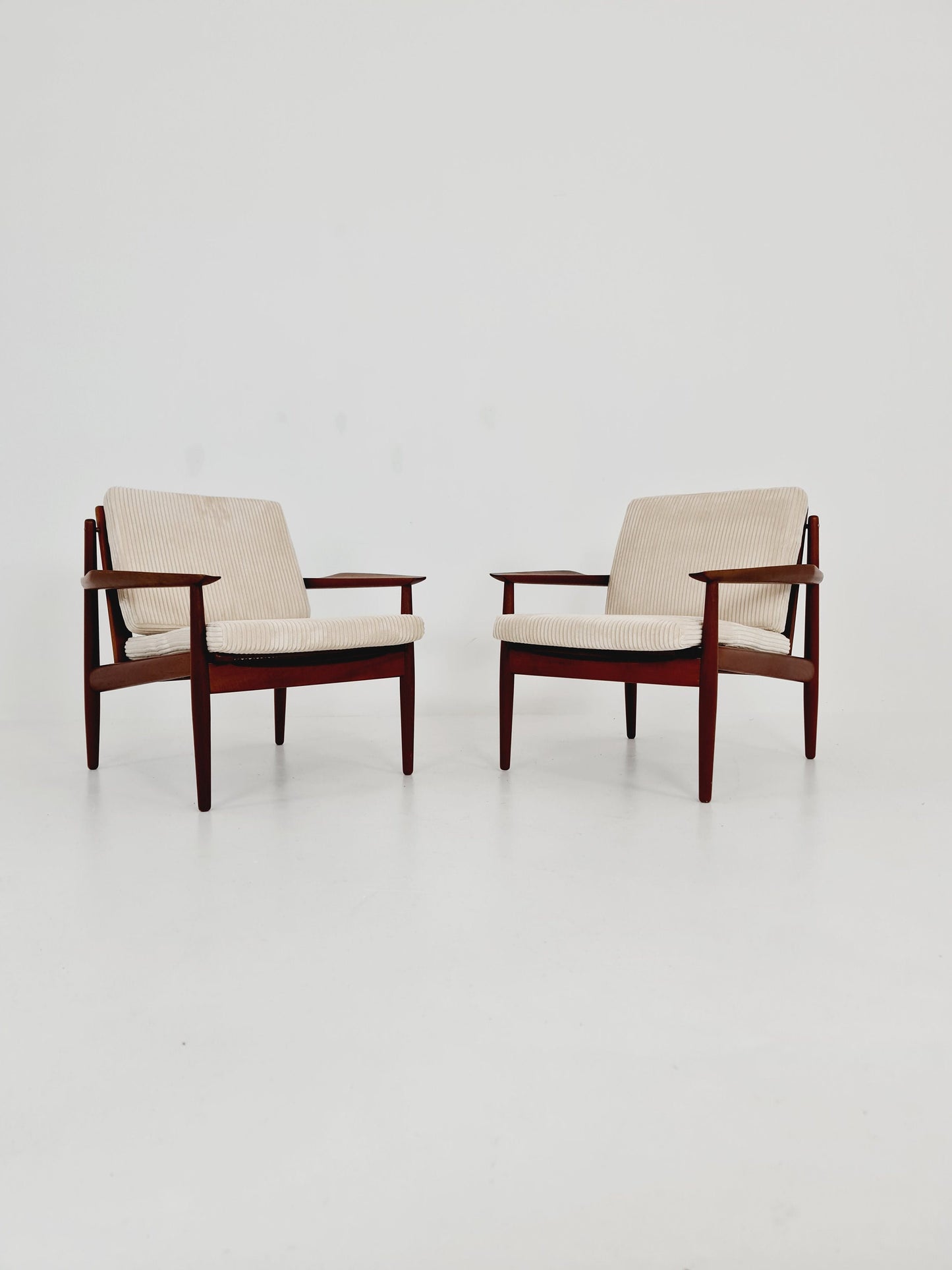 Mid century easy lounge chairs by Grete Jalk, Denmark, teak & brass, 19560s, Set of 2