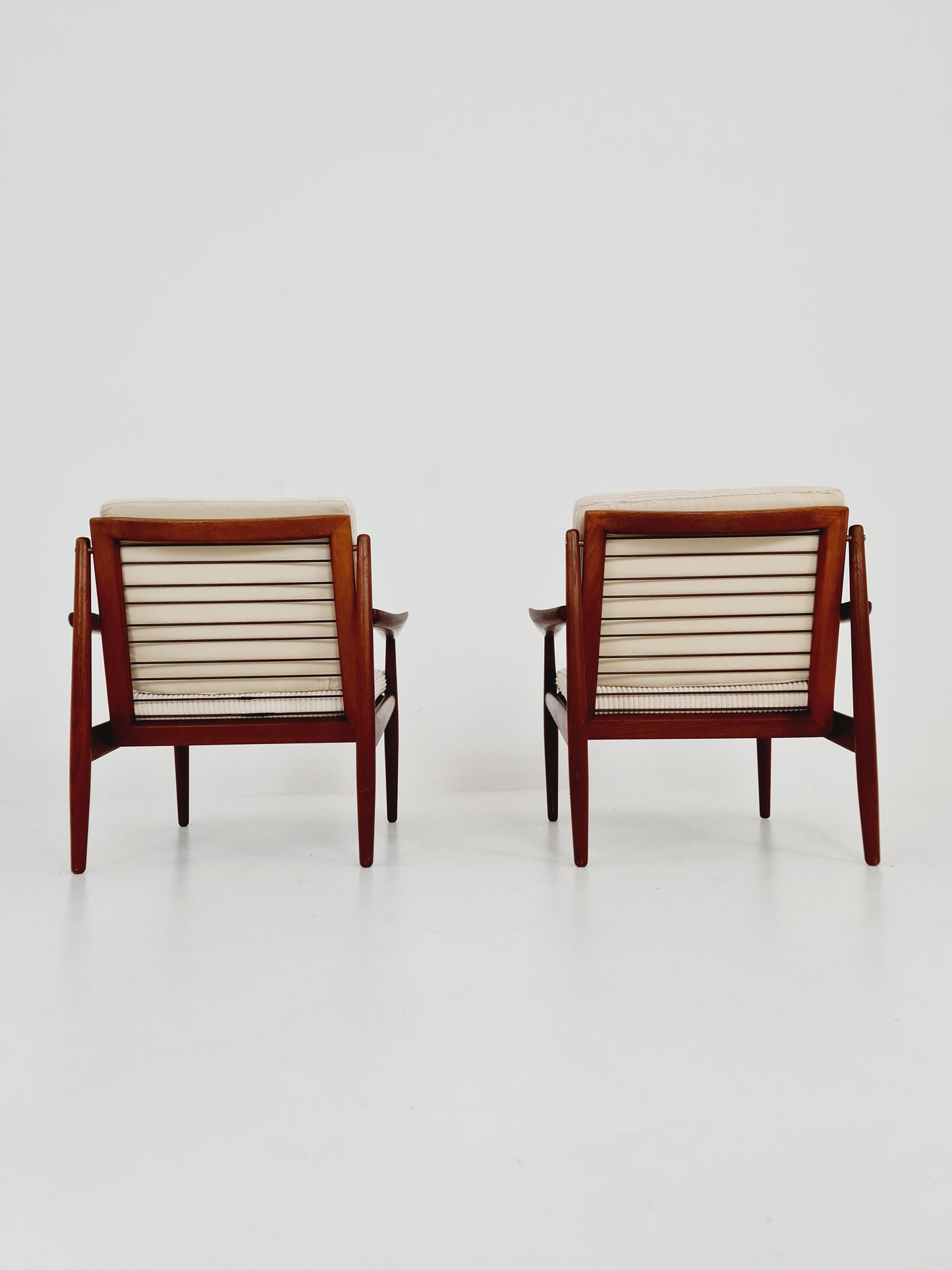 Mid century easy lounge chairs by Grete Jalk, Denmark, teak & brass, 19560s, Set of 2