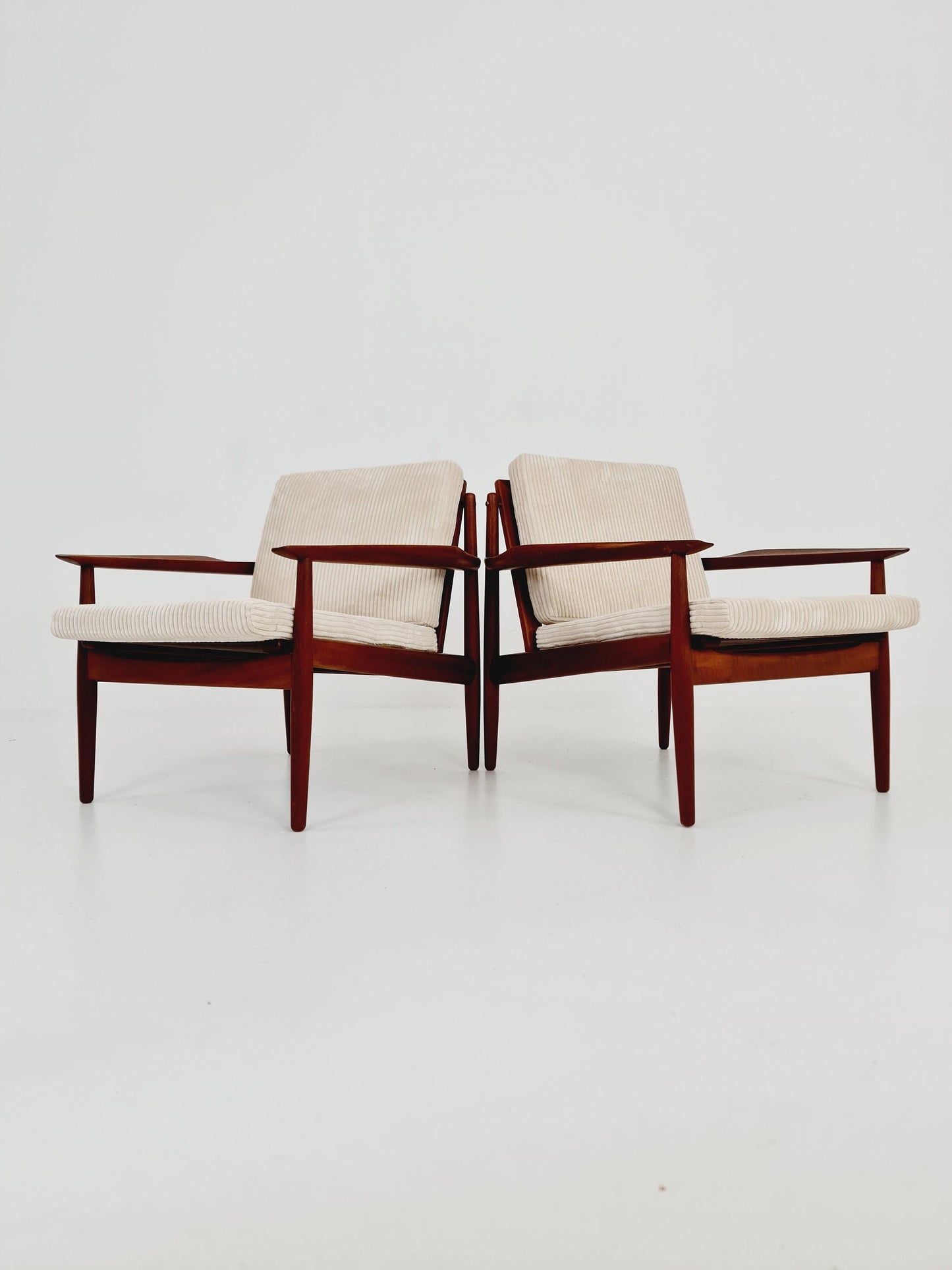 Mid century easy lounge chairs by Grete Jalk, Denmark, teak & brass, 19560s, Set of 2