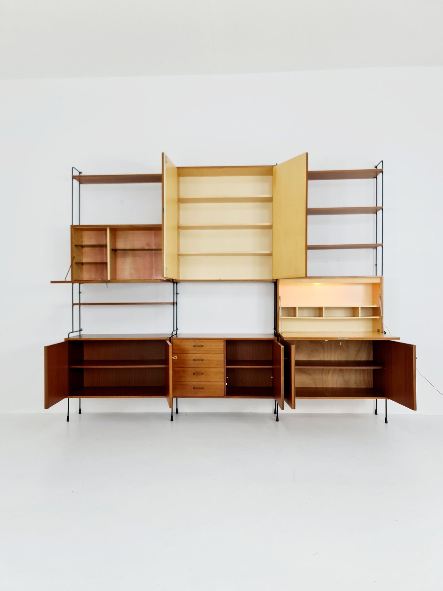 Mid century Teak 11 pieces shelving unit by Hilker for Omnia, Germany 1960s
