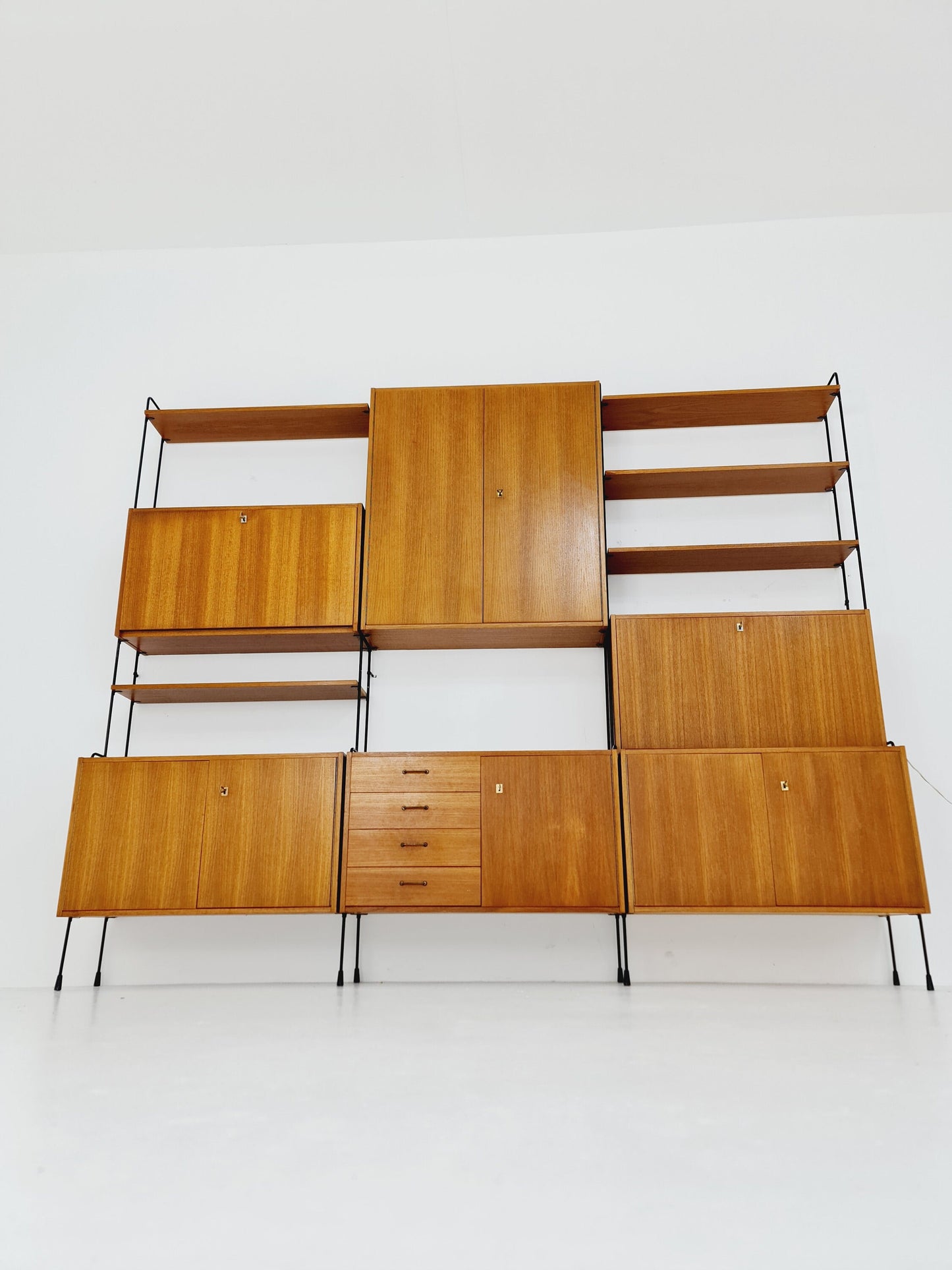 Mid century Teak 11 pieces shelving unit by Hilker for Omnia, Germany 1960s