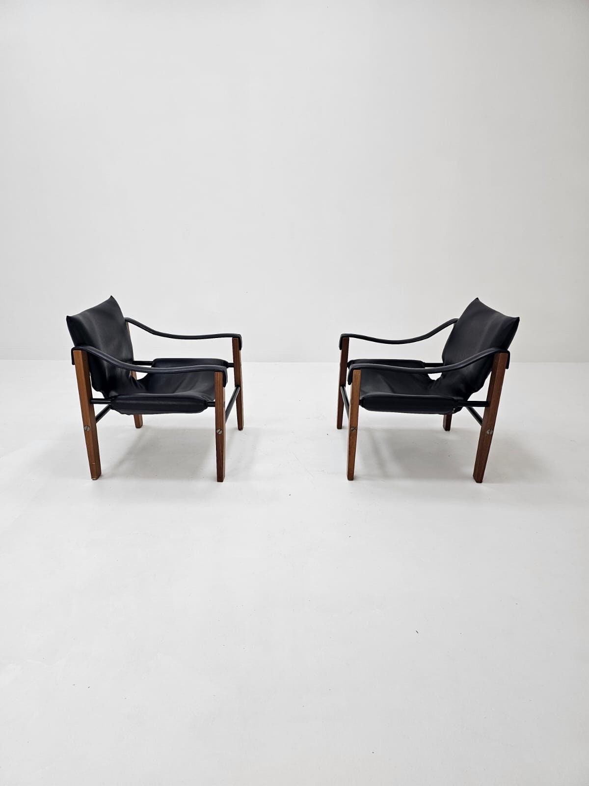 1 of 2 black leather Safari armchairs from Arkana, United Kingdom 1970s