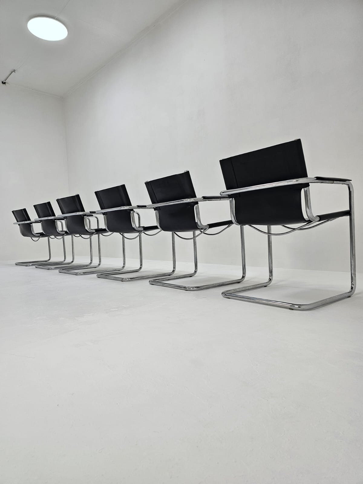 Set of 6 Matteo Grassi visitor chairs in black leather Italy 1980s