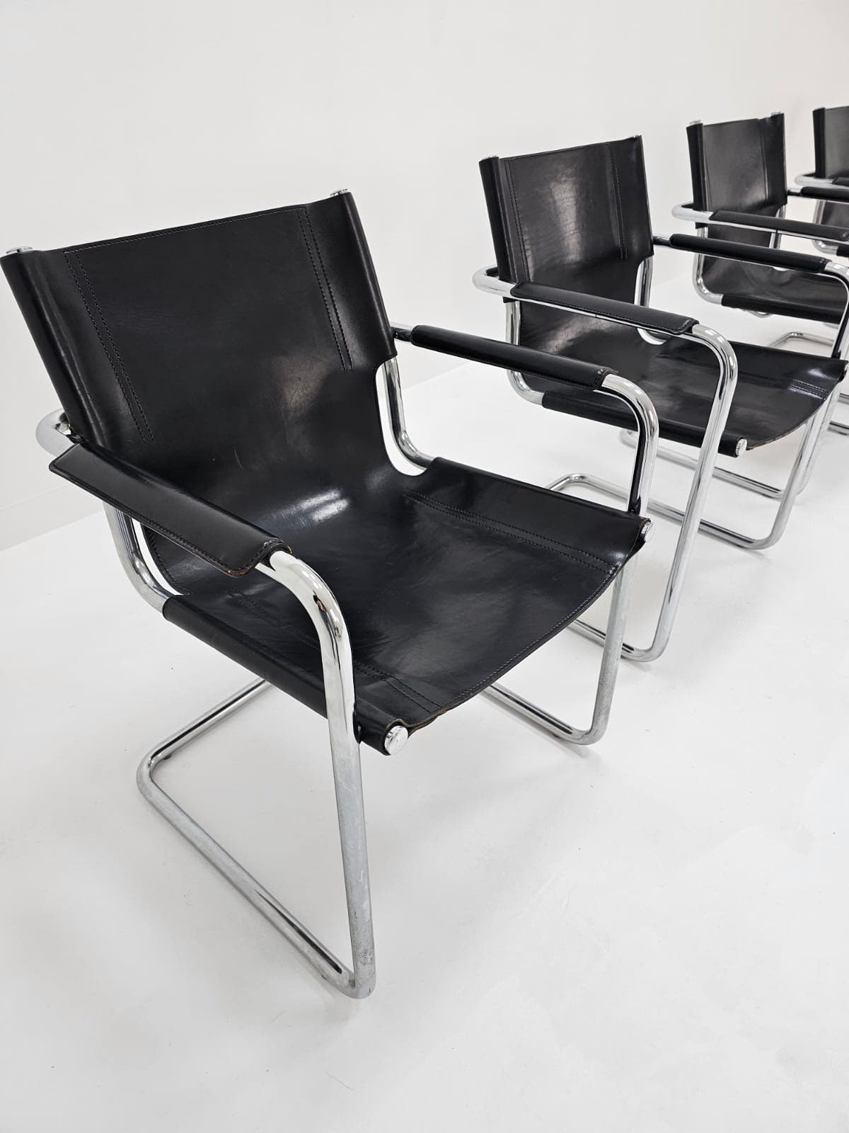 Set of 6 Matteo Grassi visitor chairs in black leather Italy 1980s