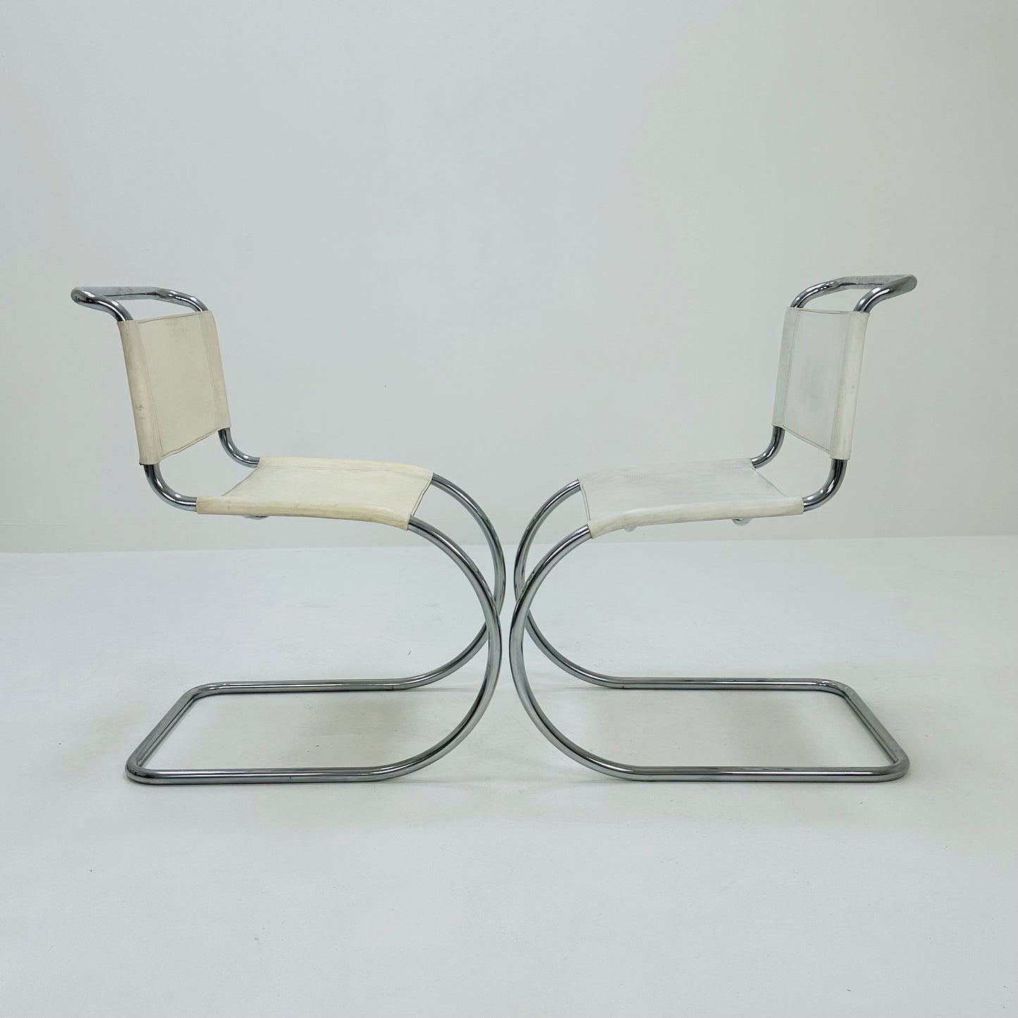 Set of 2 MR10 lounge white leather chairs design by Ludwig Mies van der Rohe , 1980s
