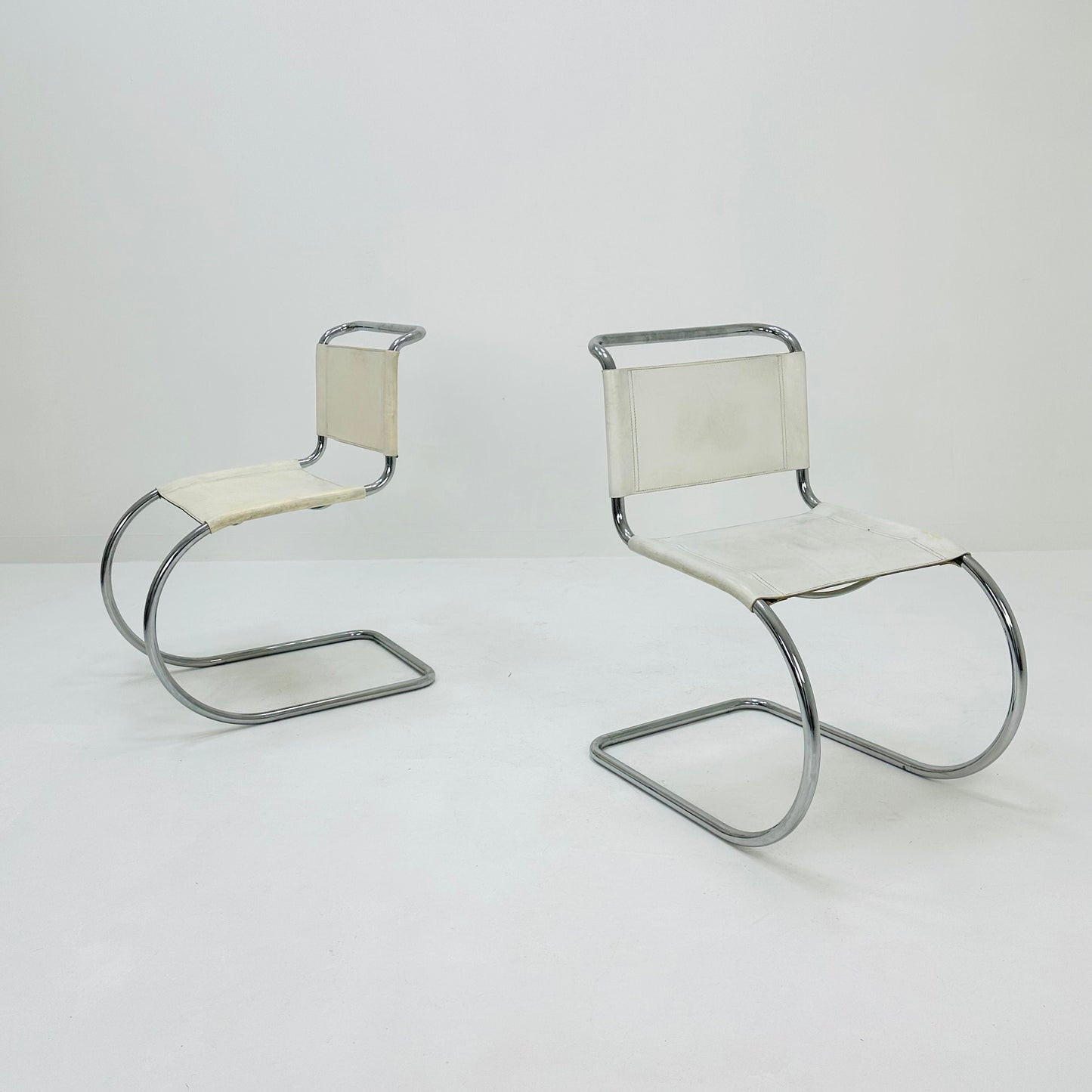Set of 2 MR10 lounge white leather chairs design by Ludwig Mies van der Rohe , 1980s
