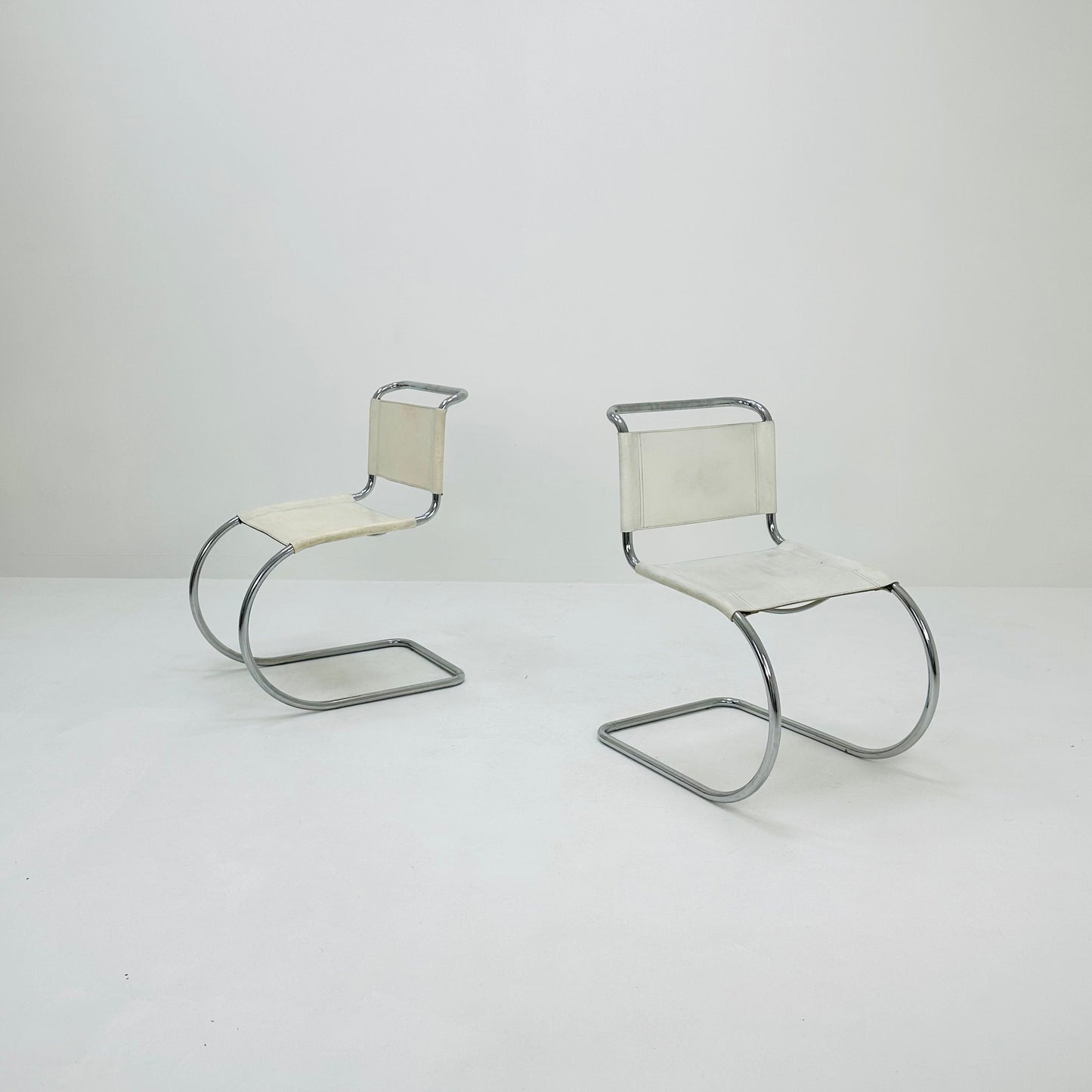 Set of 2 MR10 lounge white leather chairs design by Ludwig Mies van der Rohe , 1980s
