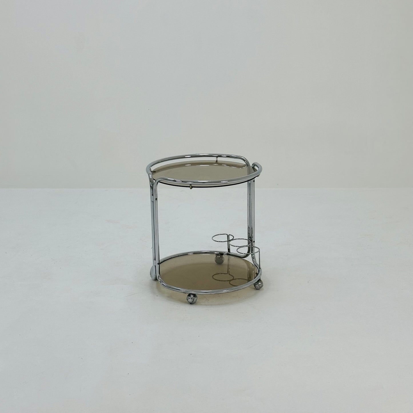 Mid century Chrome bar cart/serving trolley. Smoked glass Bauhaus Italy 1980s