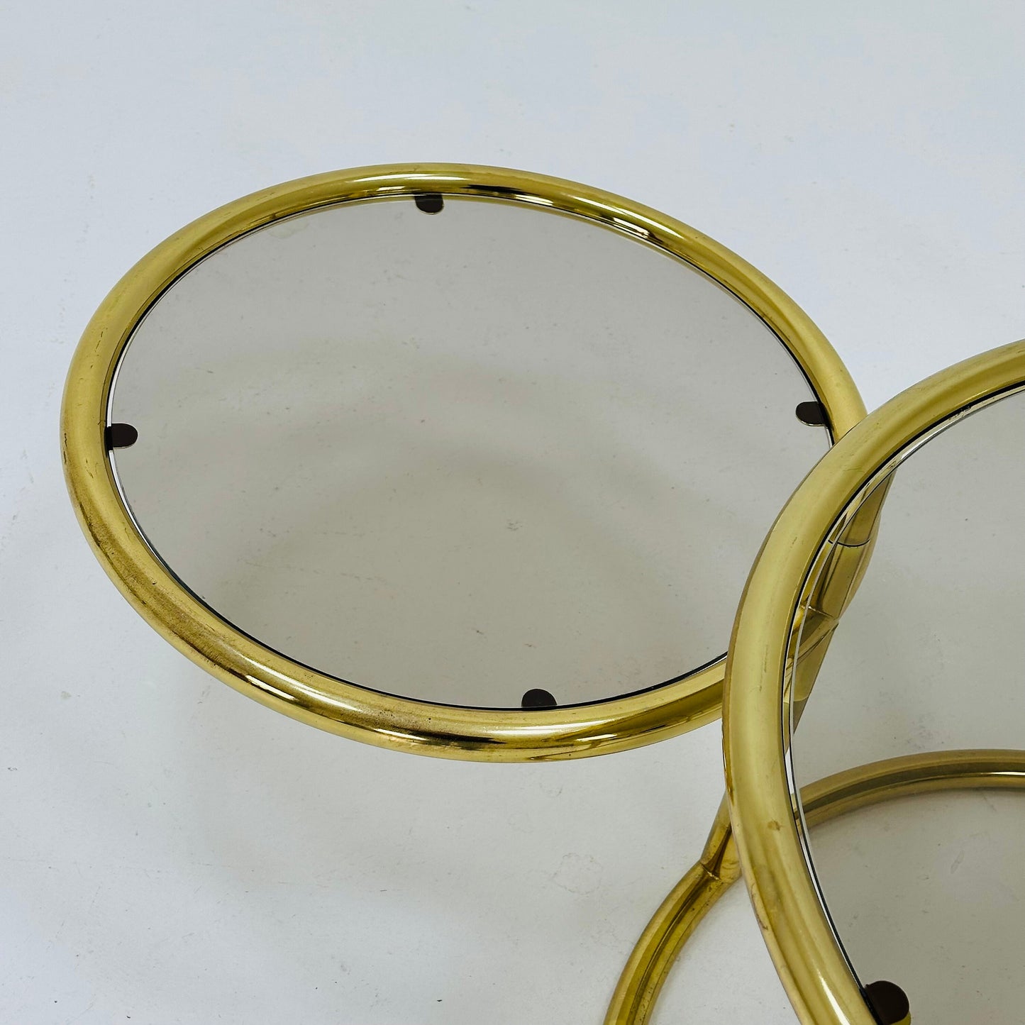 Mid century swivel coffee table brass & smoked glass ,by Milo Baughman, 1970s Italy