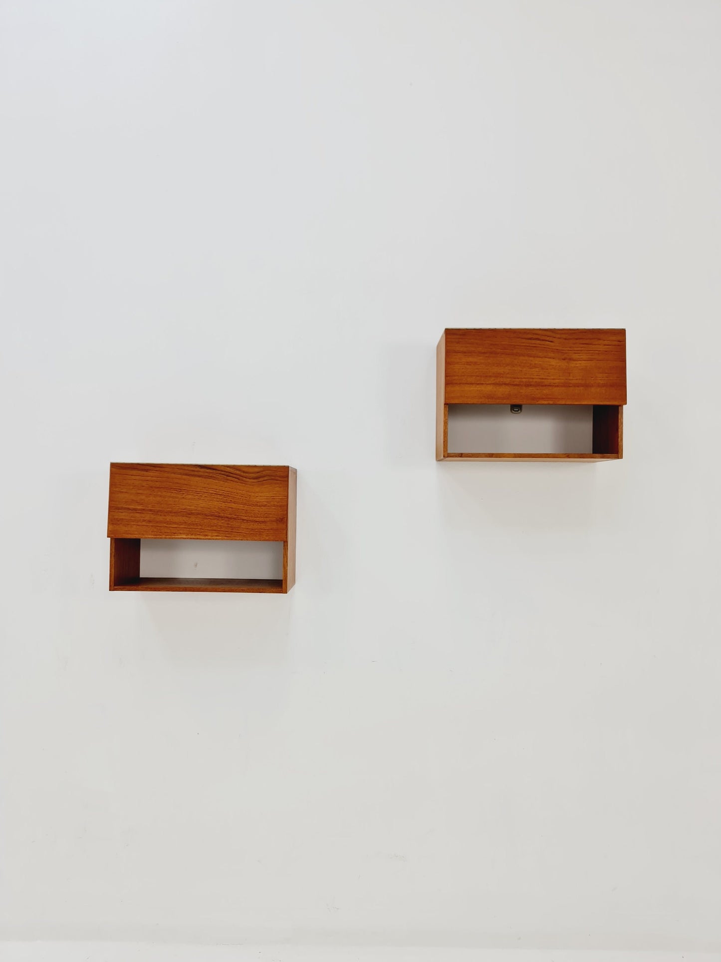 Rare pair of Danish teak floating extandable shelf nightstands, 1960s