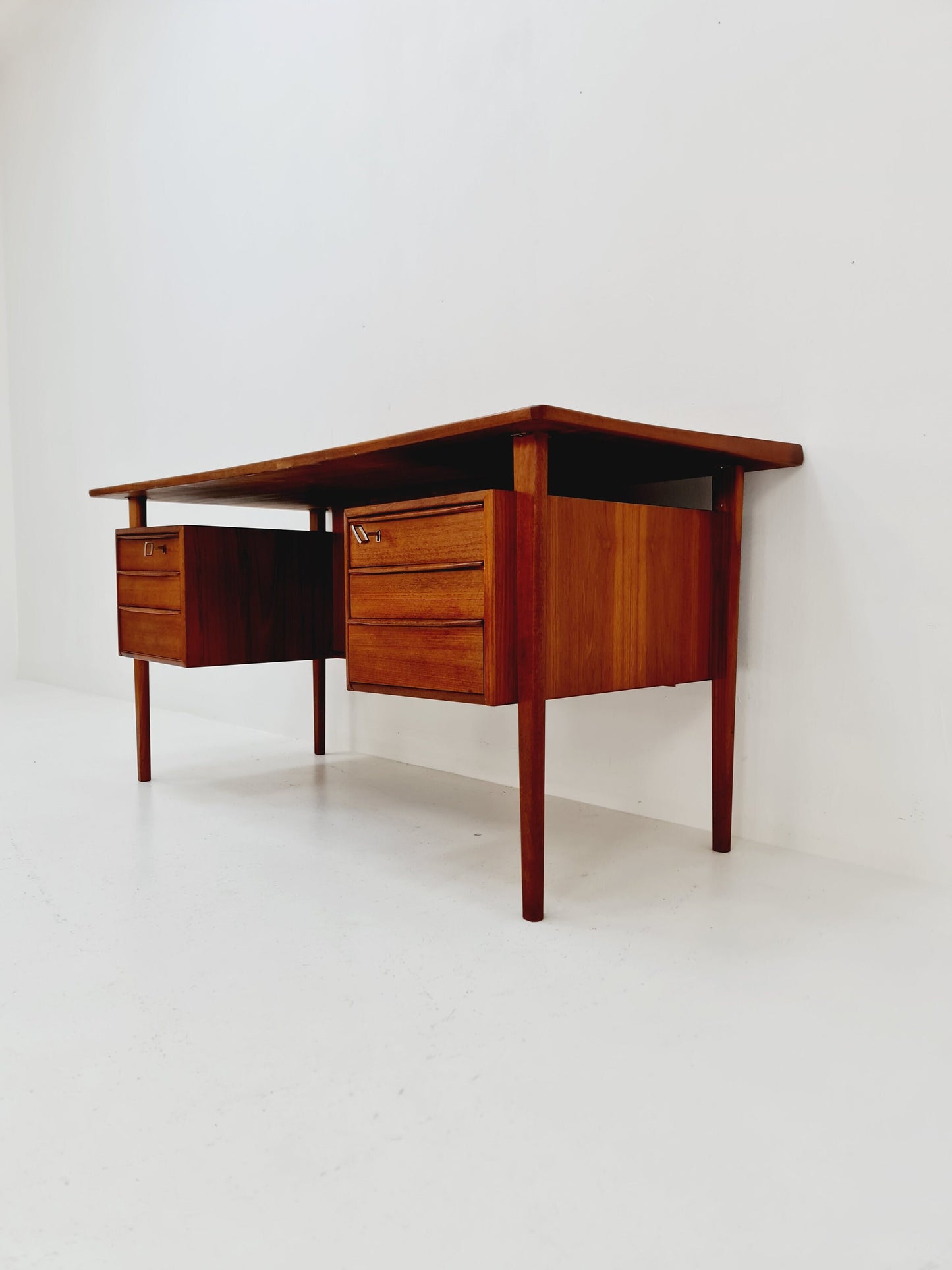 Danish teak desk by Peter Løvig Nielsen for Løvig, Denmark, 1960s