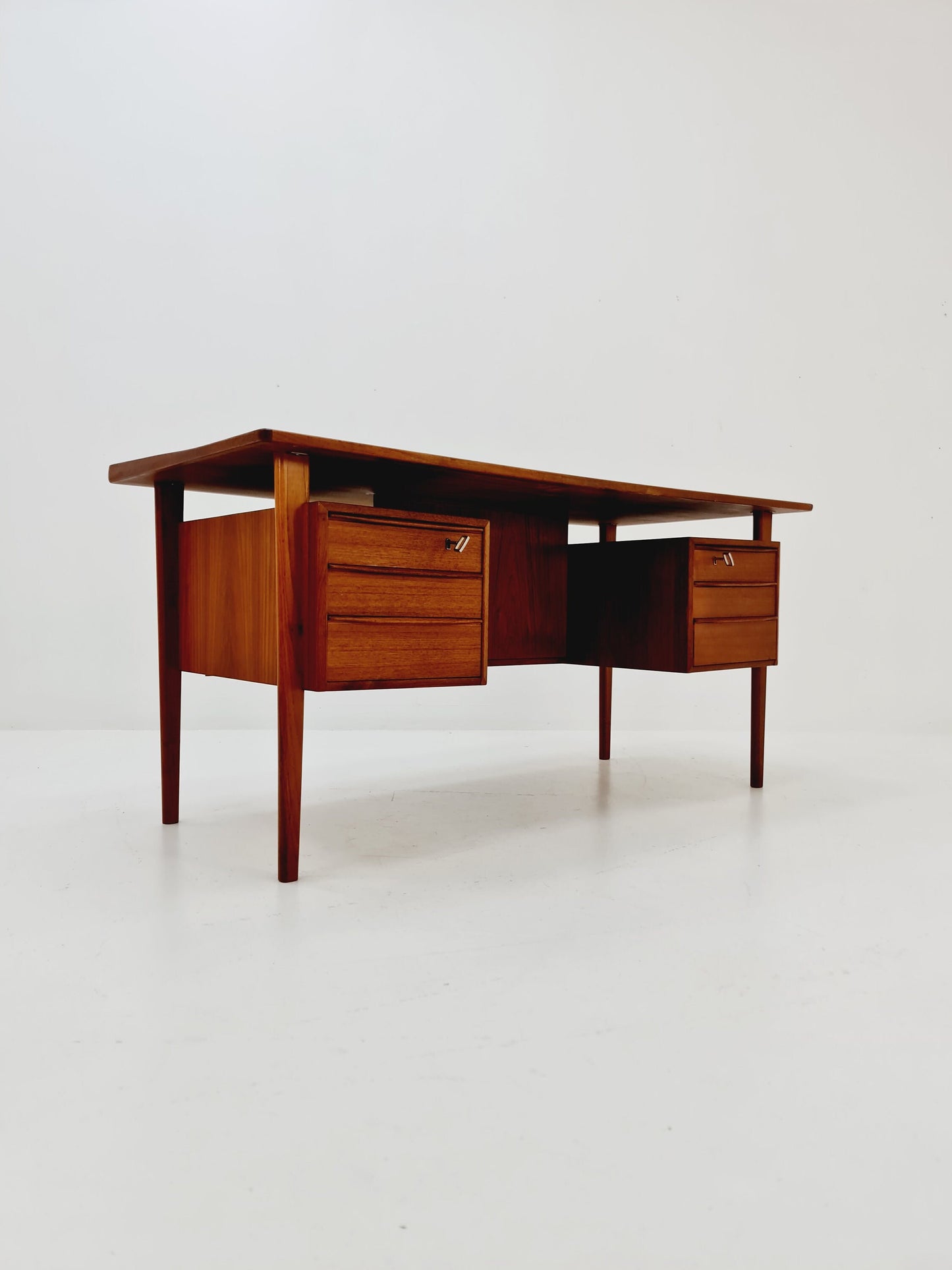 Danish teak desk by Peter Løvig Nielsen for Løvig, Denmark, 1960s