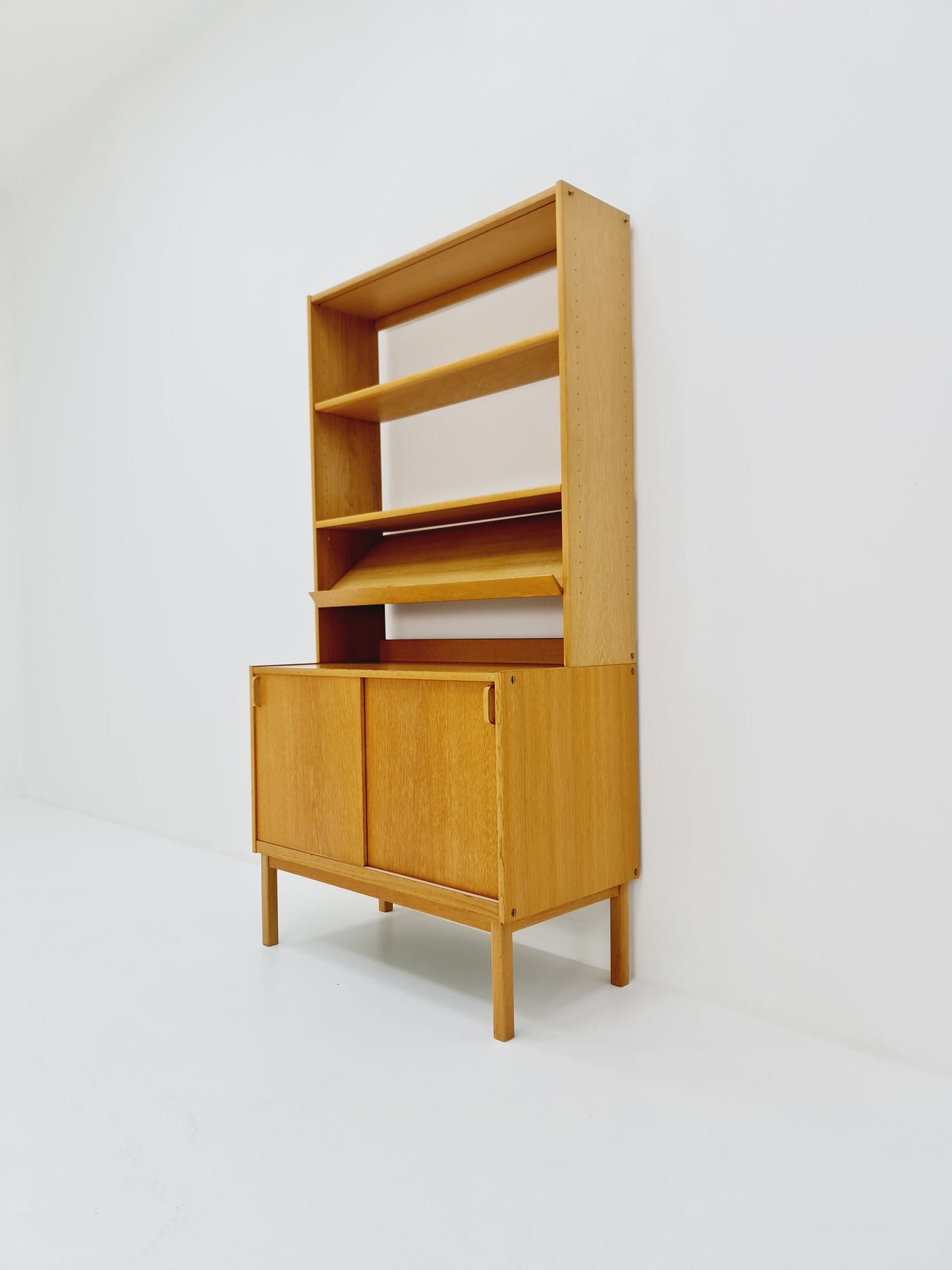 Swedish vintage book case with news Papper shelf oak by Fridhagen for Bodafors, 1960s