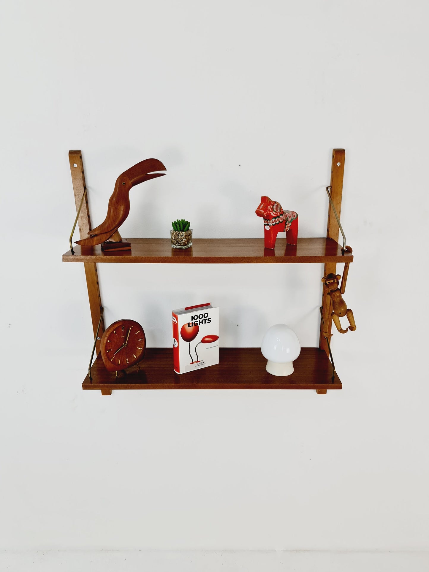 Midcentury Danish walnut Wall-Mounted Shelving Unit, by Royal for Poul Cadovius, 1960s
