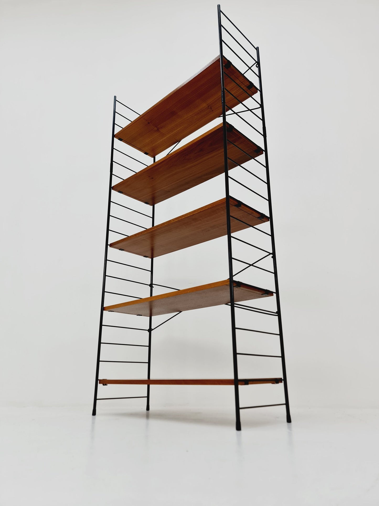 Freestanding string shelf in Teak from the 50s by WHB Germnay