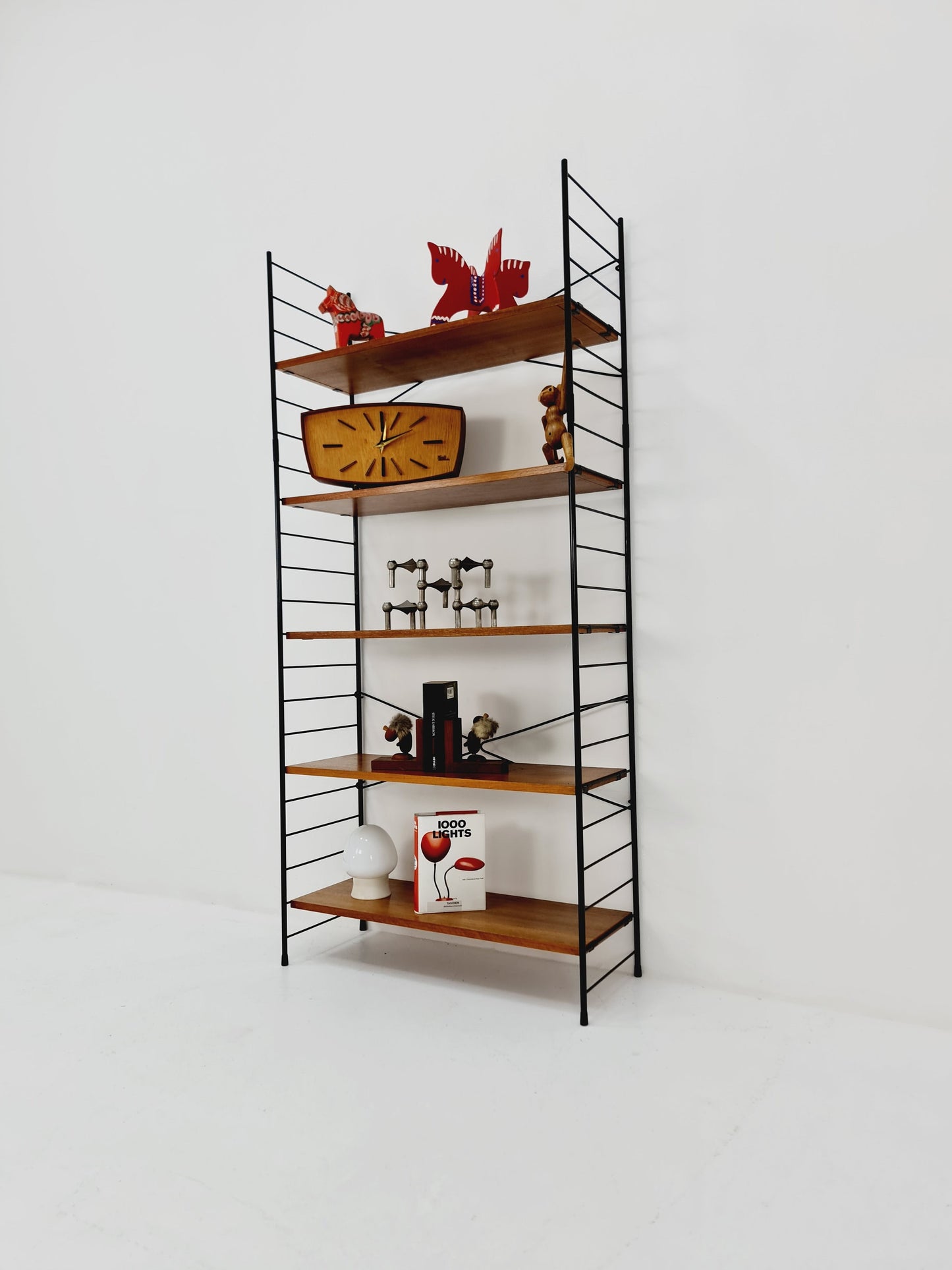 Freestanding string shelf in Teak from the 50s by WHB Germnay