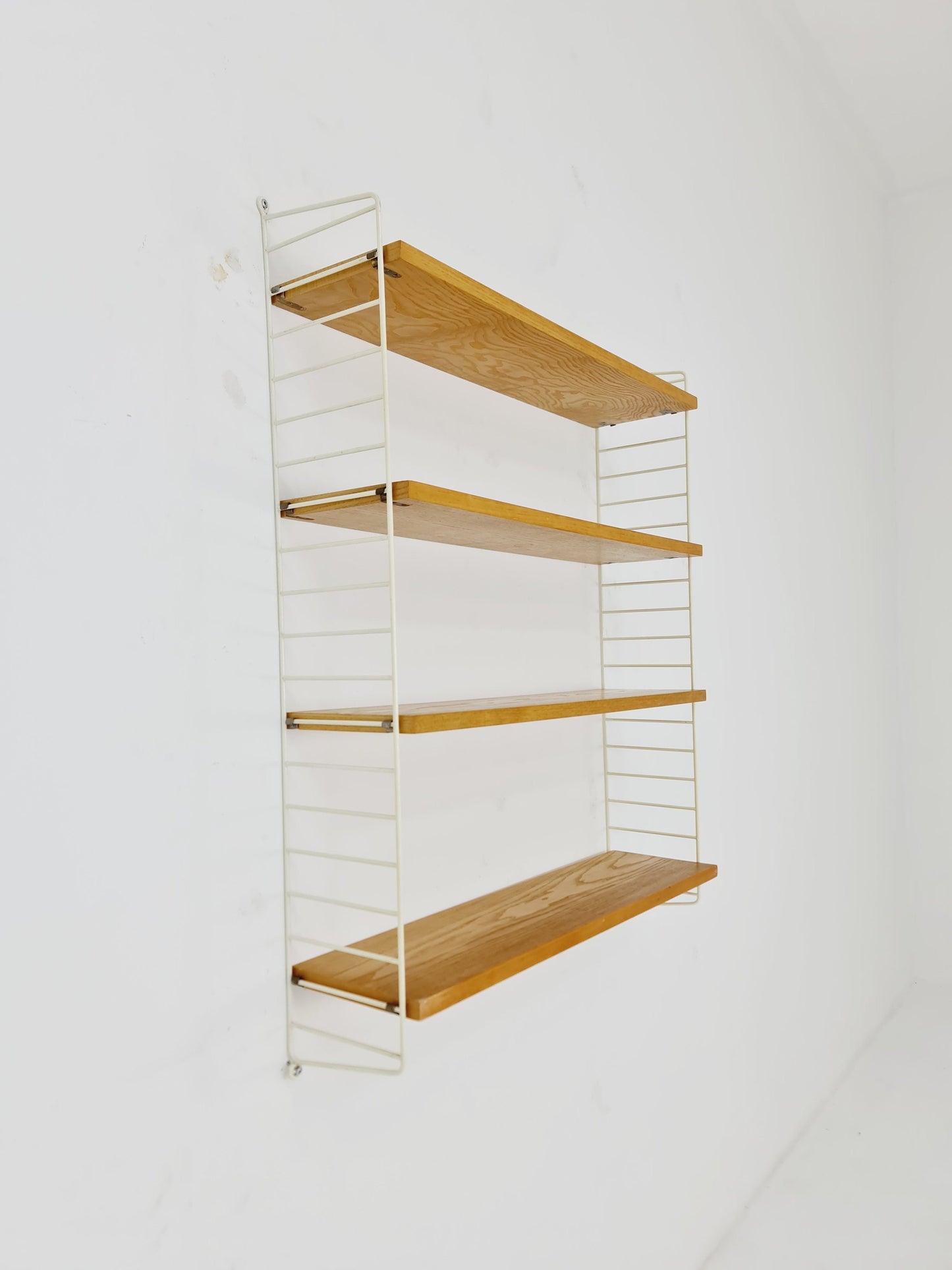 Original MCM Oak shelving system - consists of white lacquered metal ladders, from string Stockholm 1960s